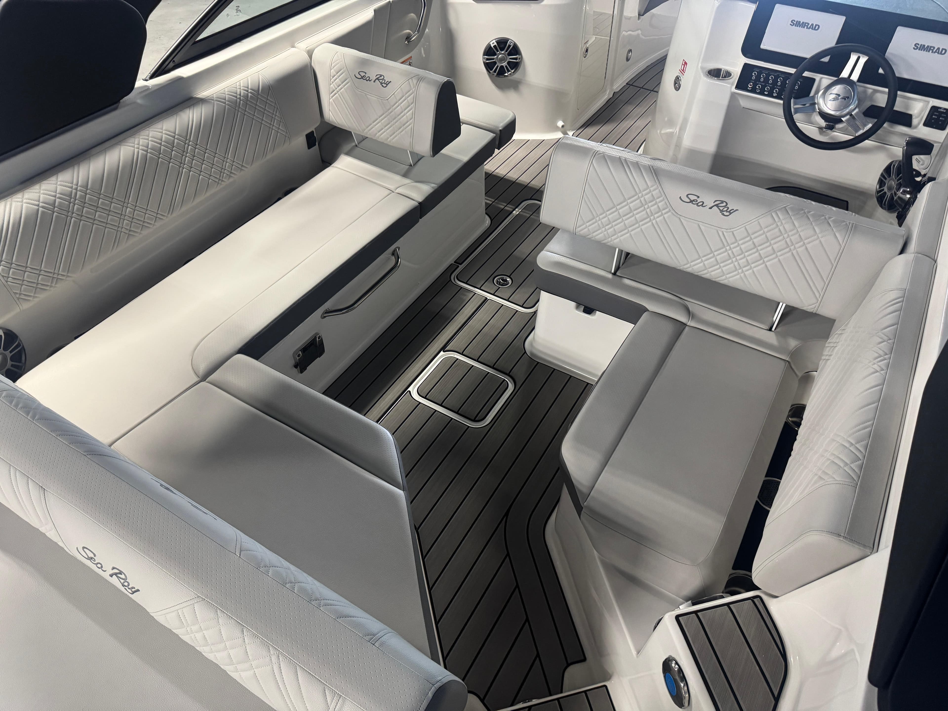 2025 Sea Ray SDX 250 boat interior with spacious seating and modern design.