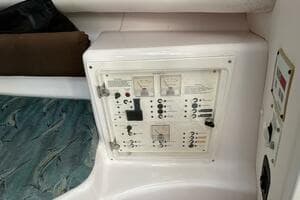 Control panel inside 2004 Pro-Line 30 Express boat cabin.