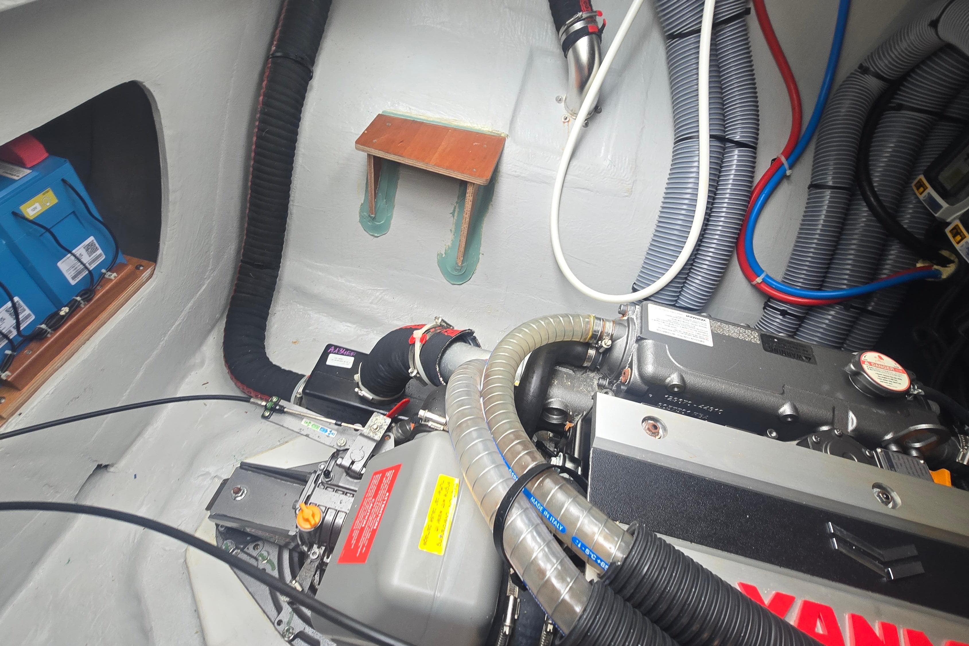 Engine room of 2024 Excess 14 yacht with Yanmar engine and wiring.