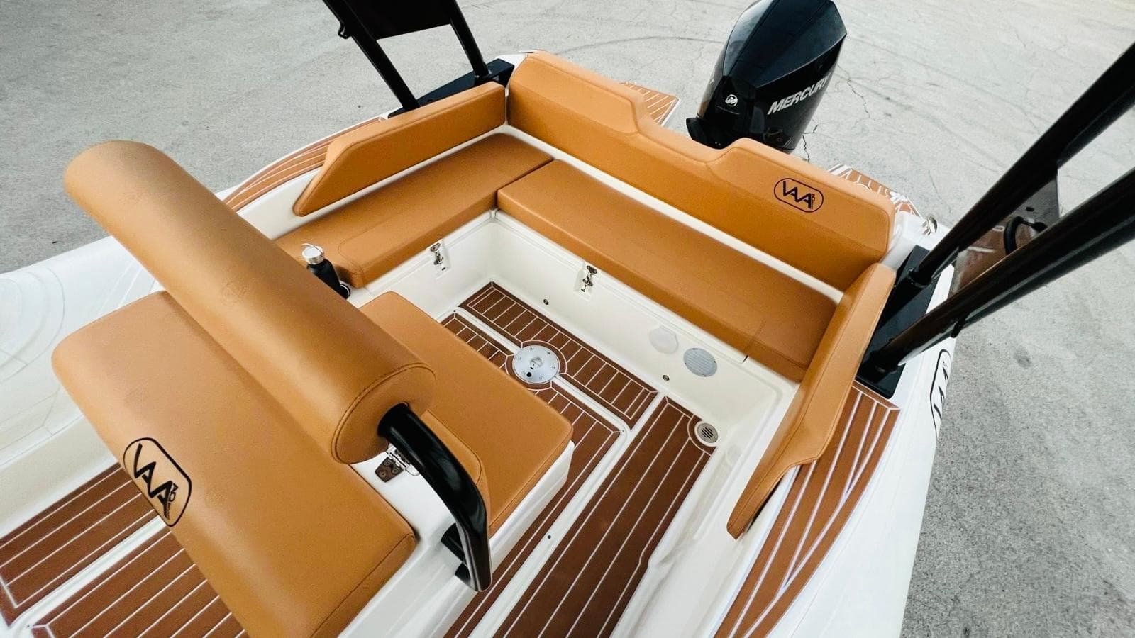 Aqvaboats Luxrib 22, 2025 model, featuring luxurious tan seating and wood-style flooring.