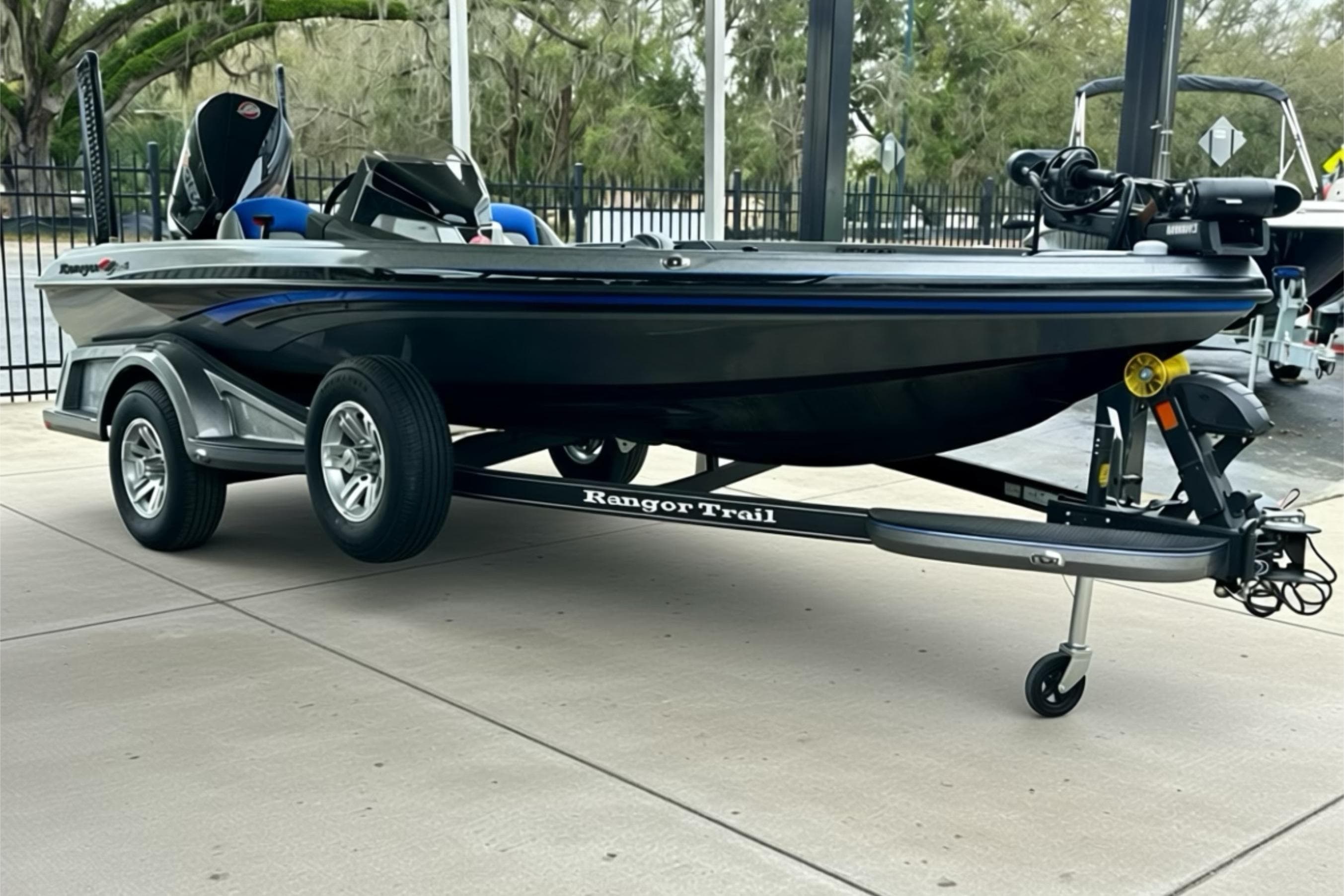 2026 Ranger Z518 boat on trailer, sleek design, parked outdoors.