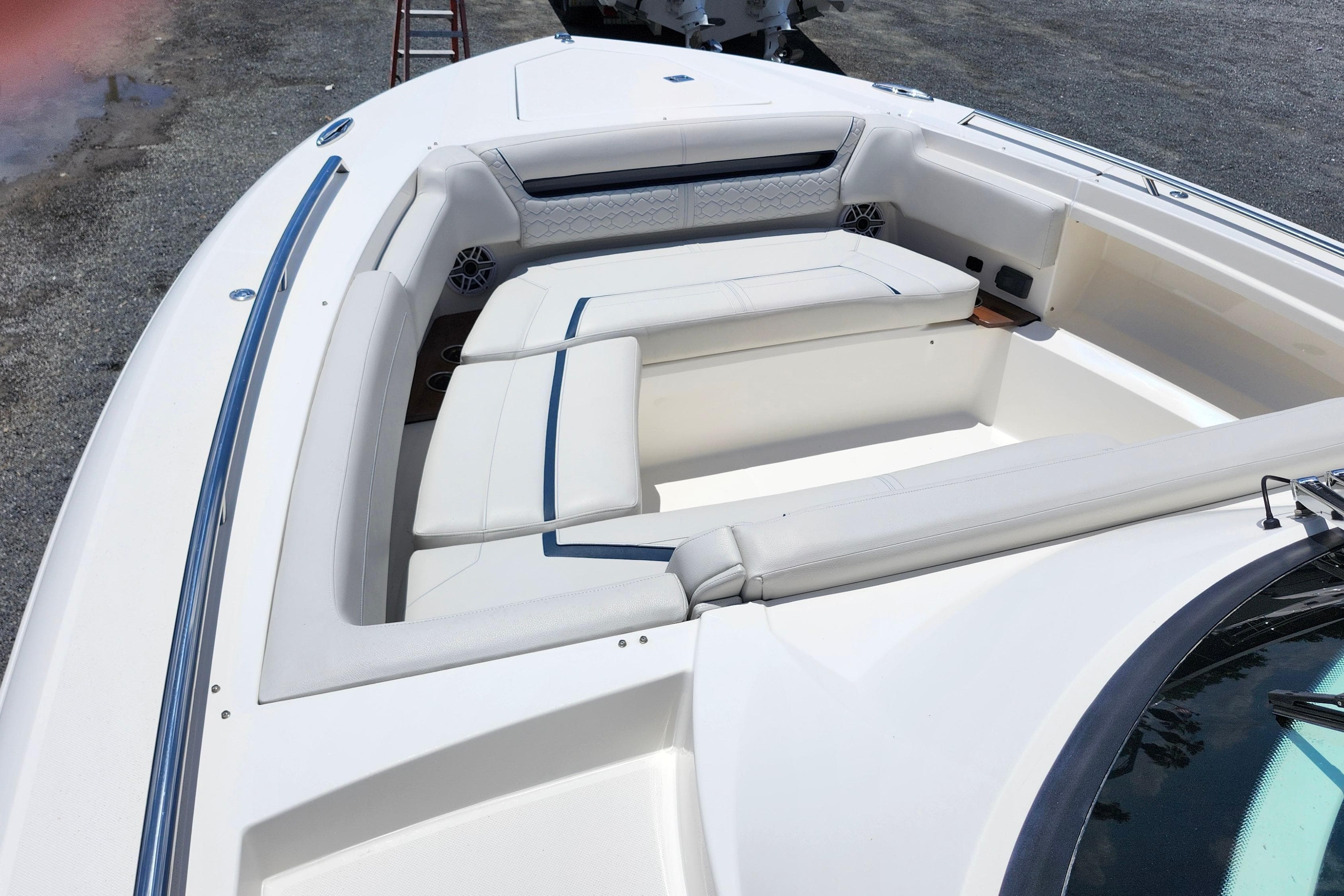 2022 Tiara Yachts 38 LS boat with spacious white seating area.