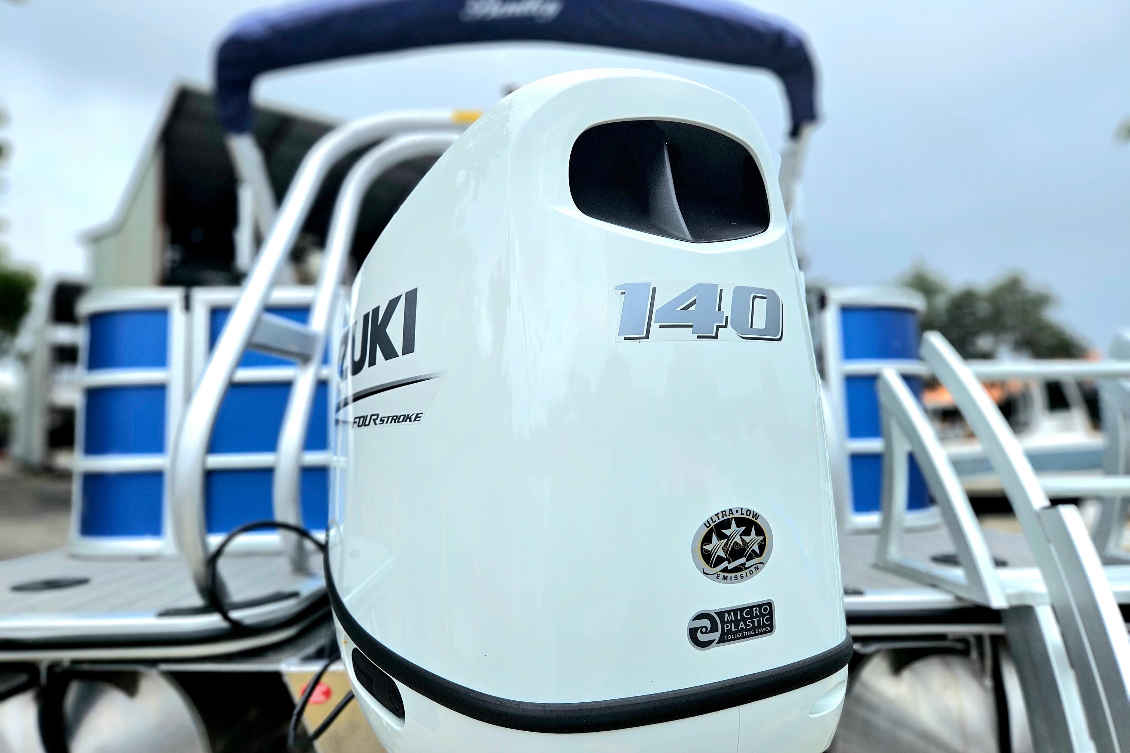 2026 Bentley Pontoons 203 Fish-N-Cruise with Suzuki 140 outboard motor, showcasing sleek design.