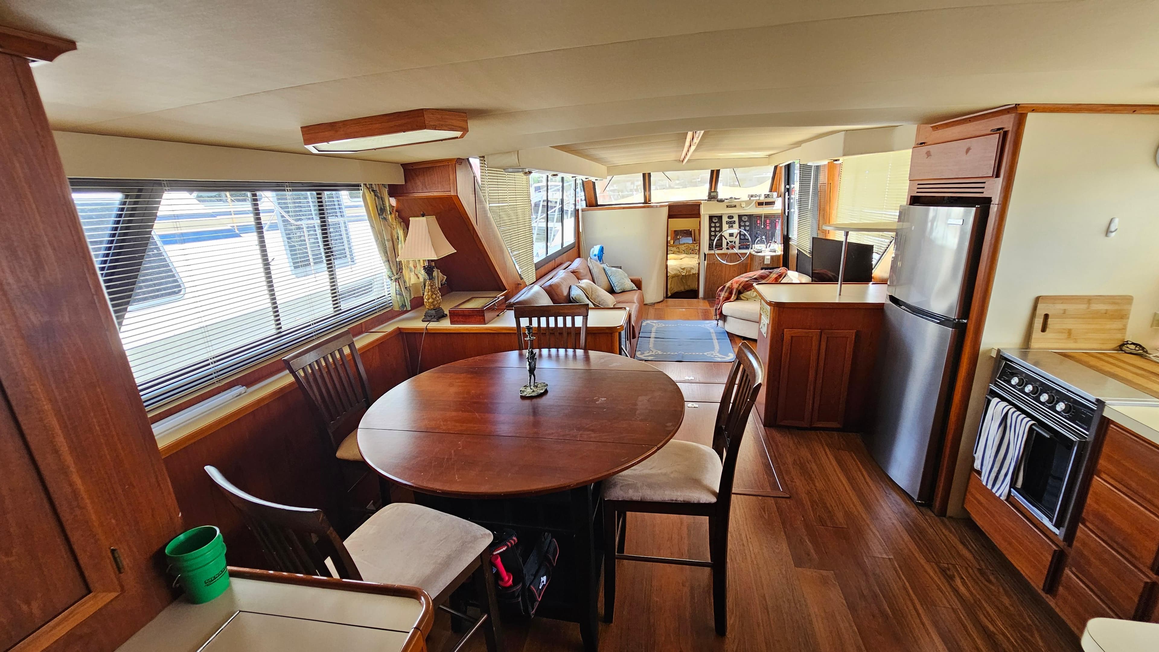 Interior of 1988 Bluewater Yachts 55 Coastal Cruiser with dining area and kitchen.