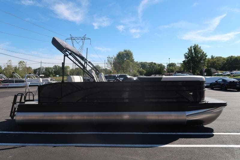 2026 Bennington S Swingback 22 SSB pontoon boat parked outdoors on a sunny day.