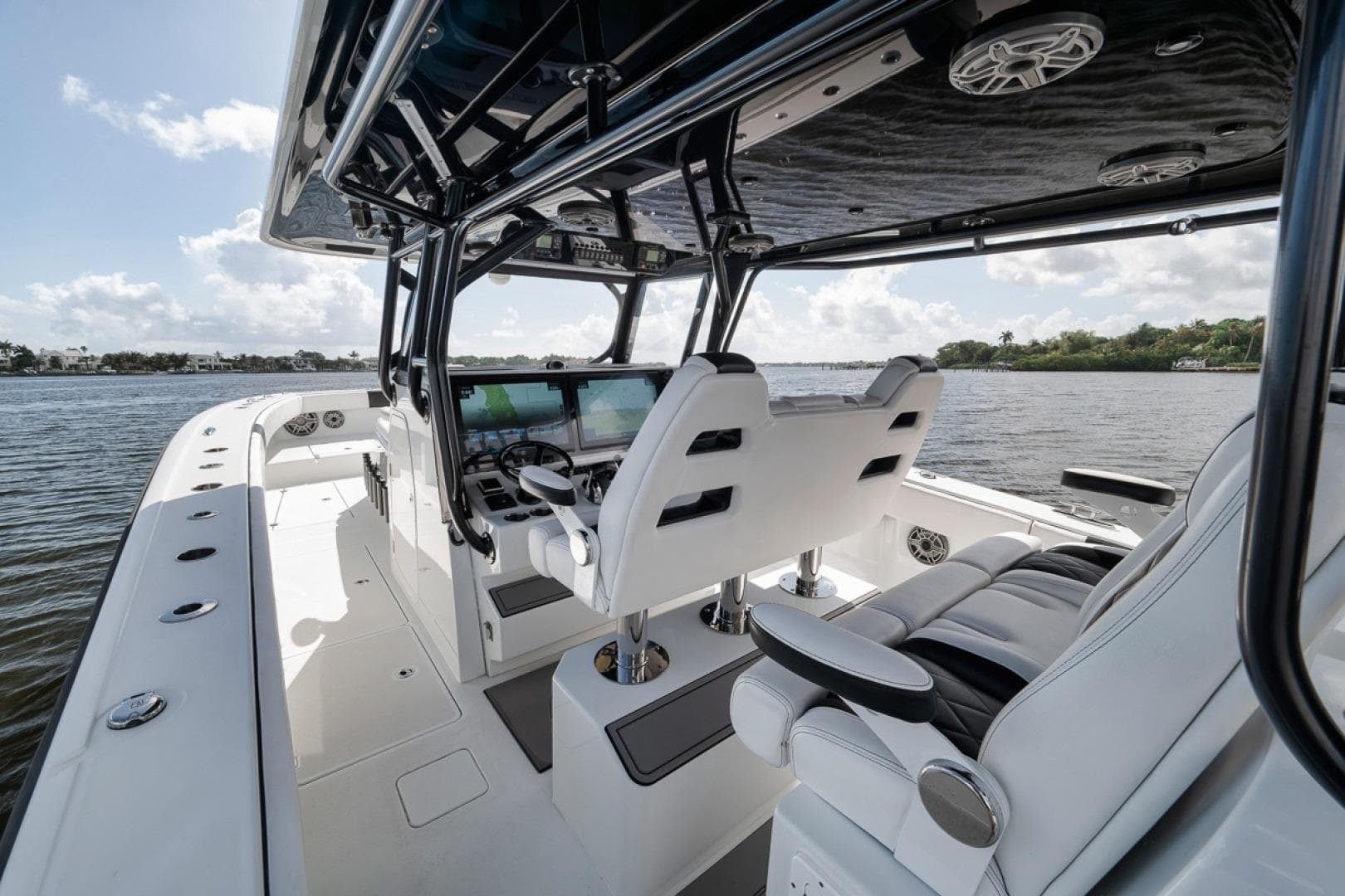Interior view of 2020 Freeman 42LR boat with modern helm and seating.