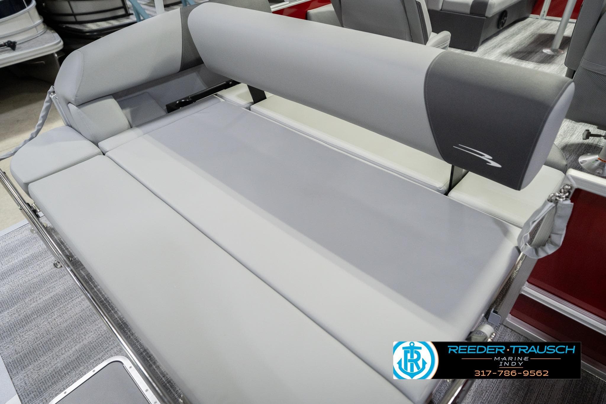 2026 Bennington 20 SSR boat interior with gray seating and modern design.