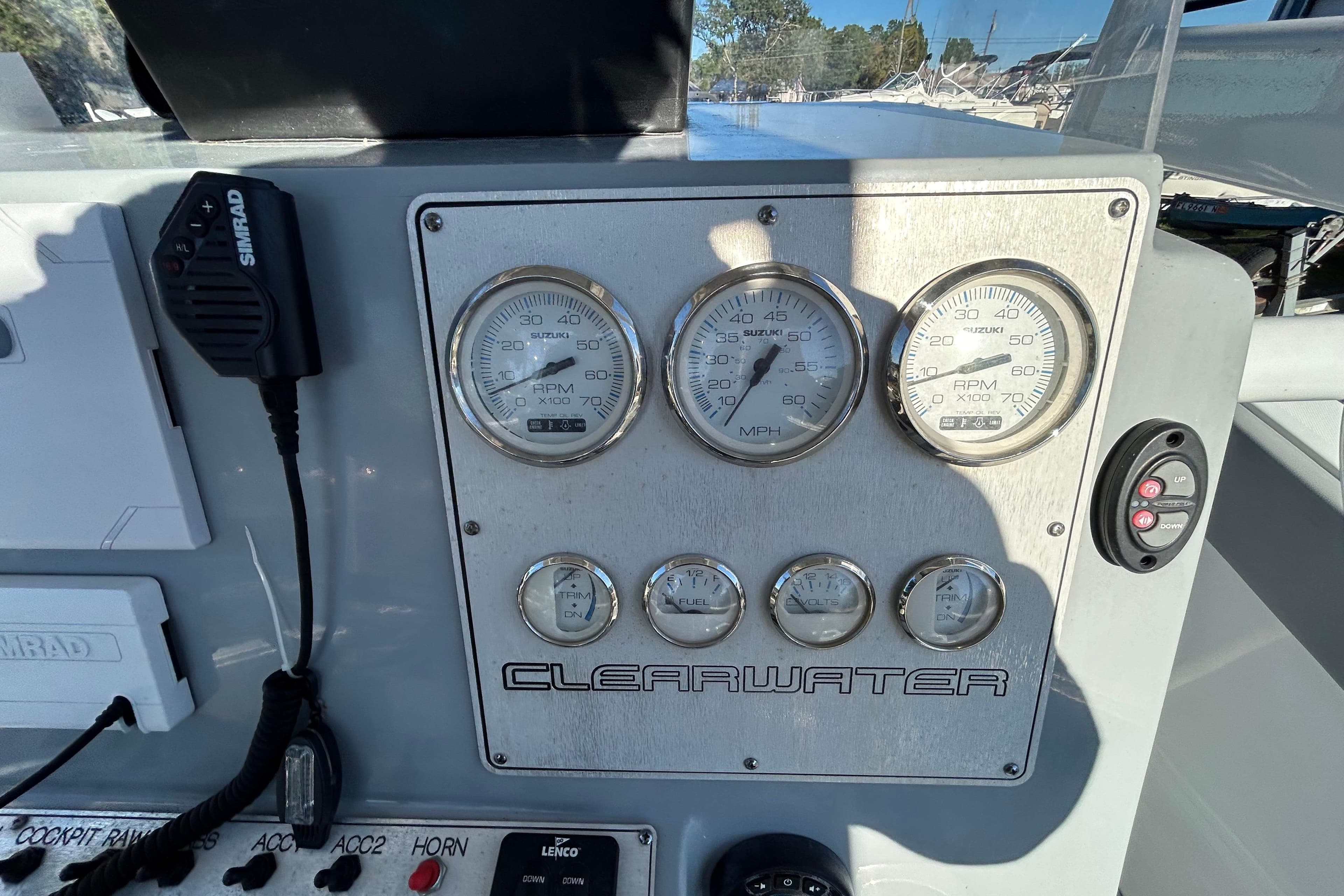 Dashboard of 2022 Clearwater 2300 boat with gauges and controls.
