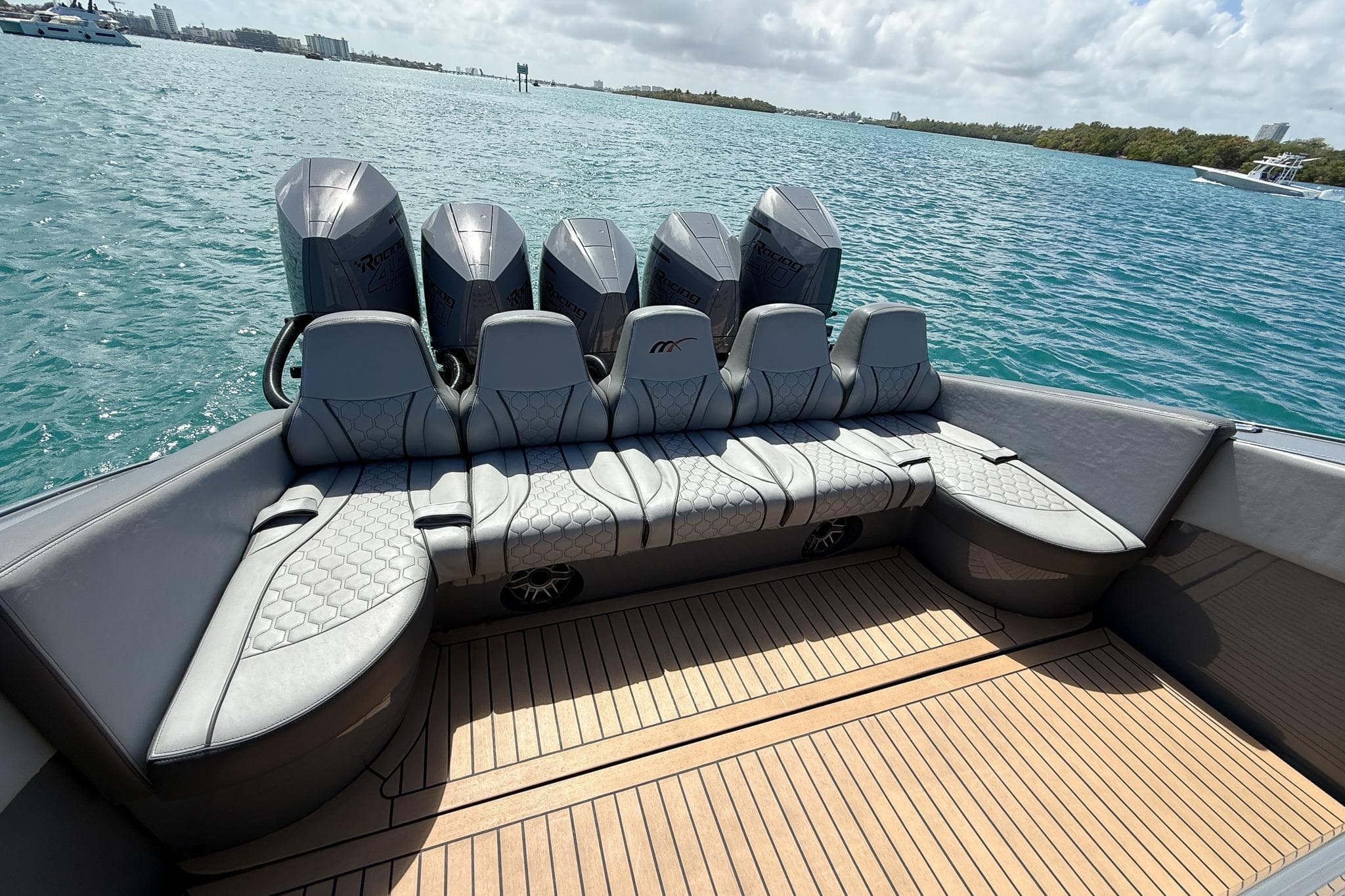 2023 Midnight Express 43 Solstice boat with luxurious seating and powerful engines on open water.