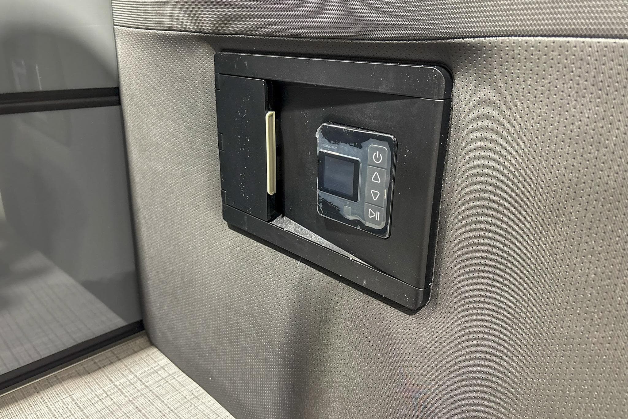 Control panel on 2025 Trifecta 22RF CS boat, featuring sleek design and modern interface.
