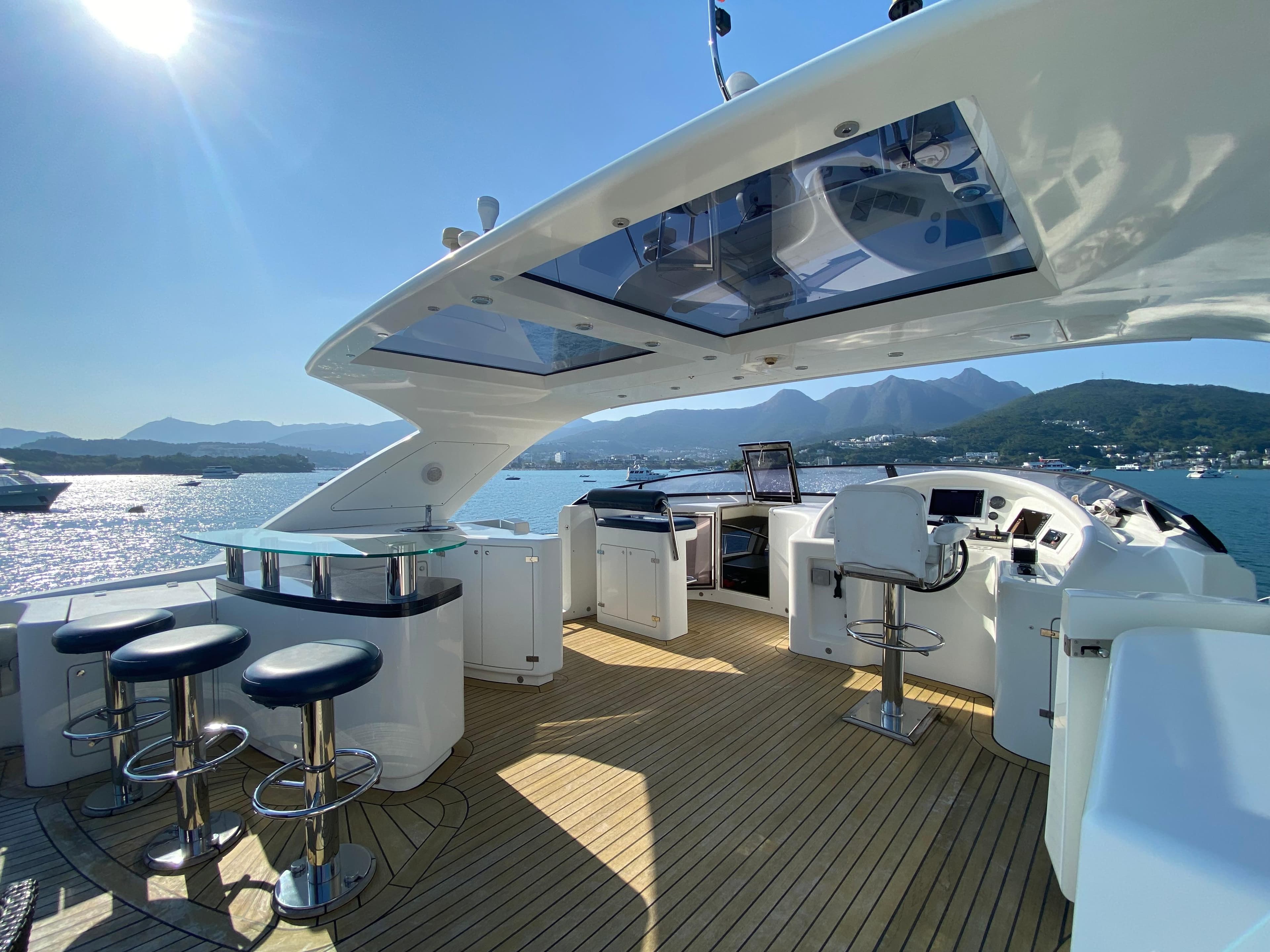 Luxurious 2007 Platinum PR Marine Romantica 103 yacht deck with seating and ocean view.
