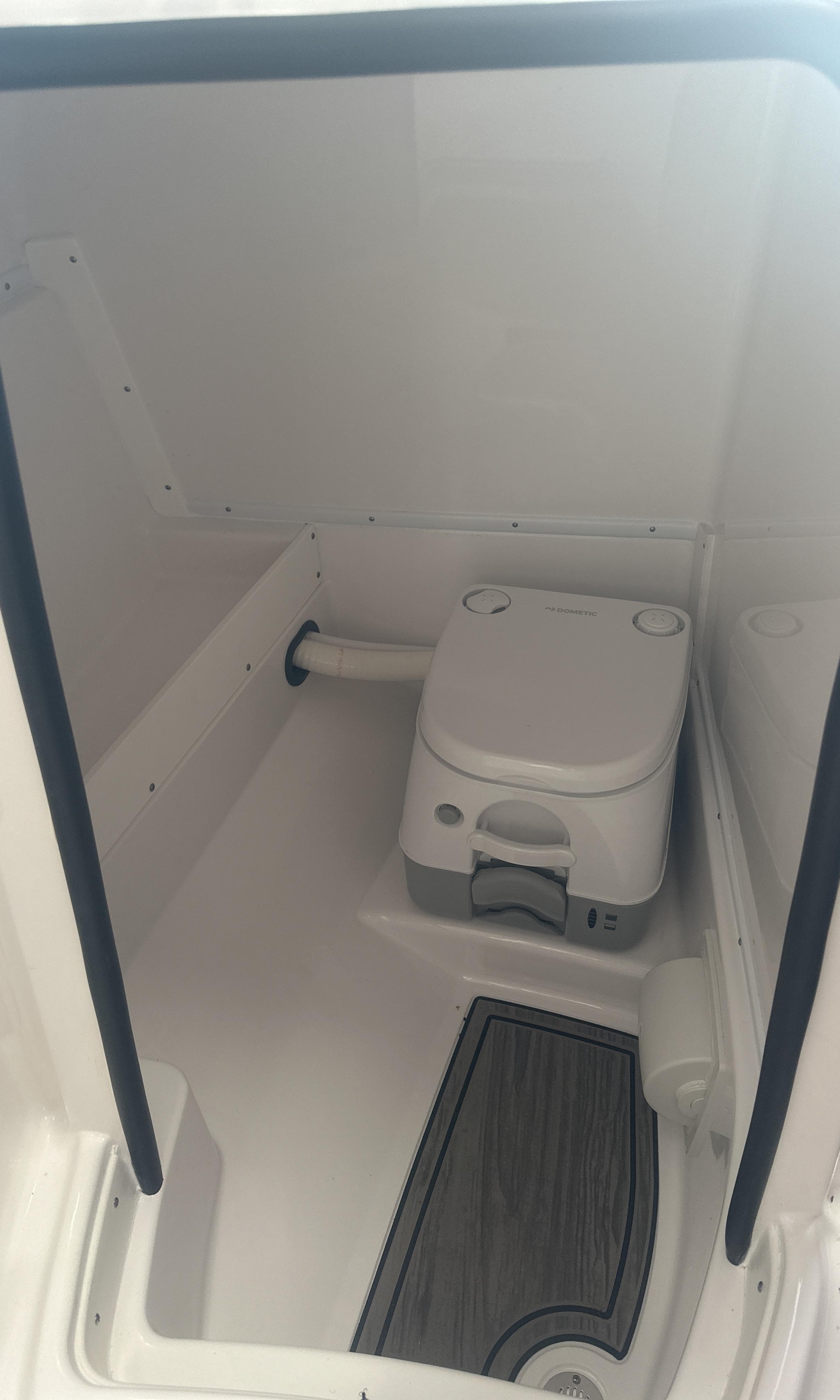 2025 Monterey M45 boat interior with compact marine toilet.