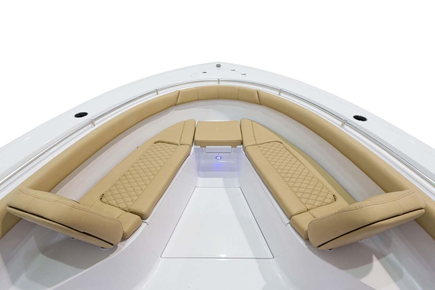 Manufacturer Provided Image: 2024 Sportsman Open 302 Center Console boat with tan cushioned seating.