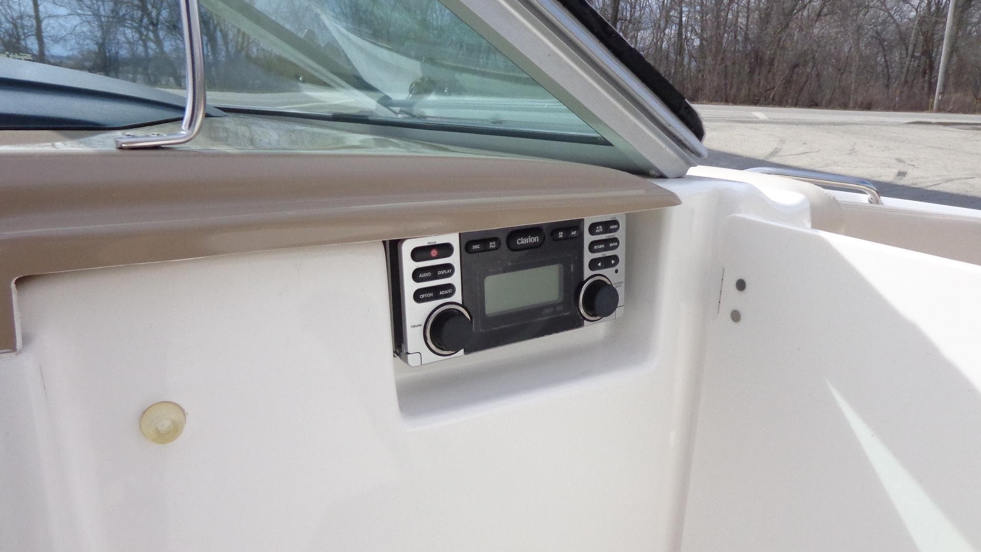 Stereo system on a 2011 Chaparral 206 SSi boat dashboard.