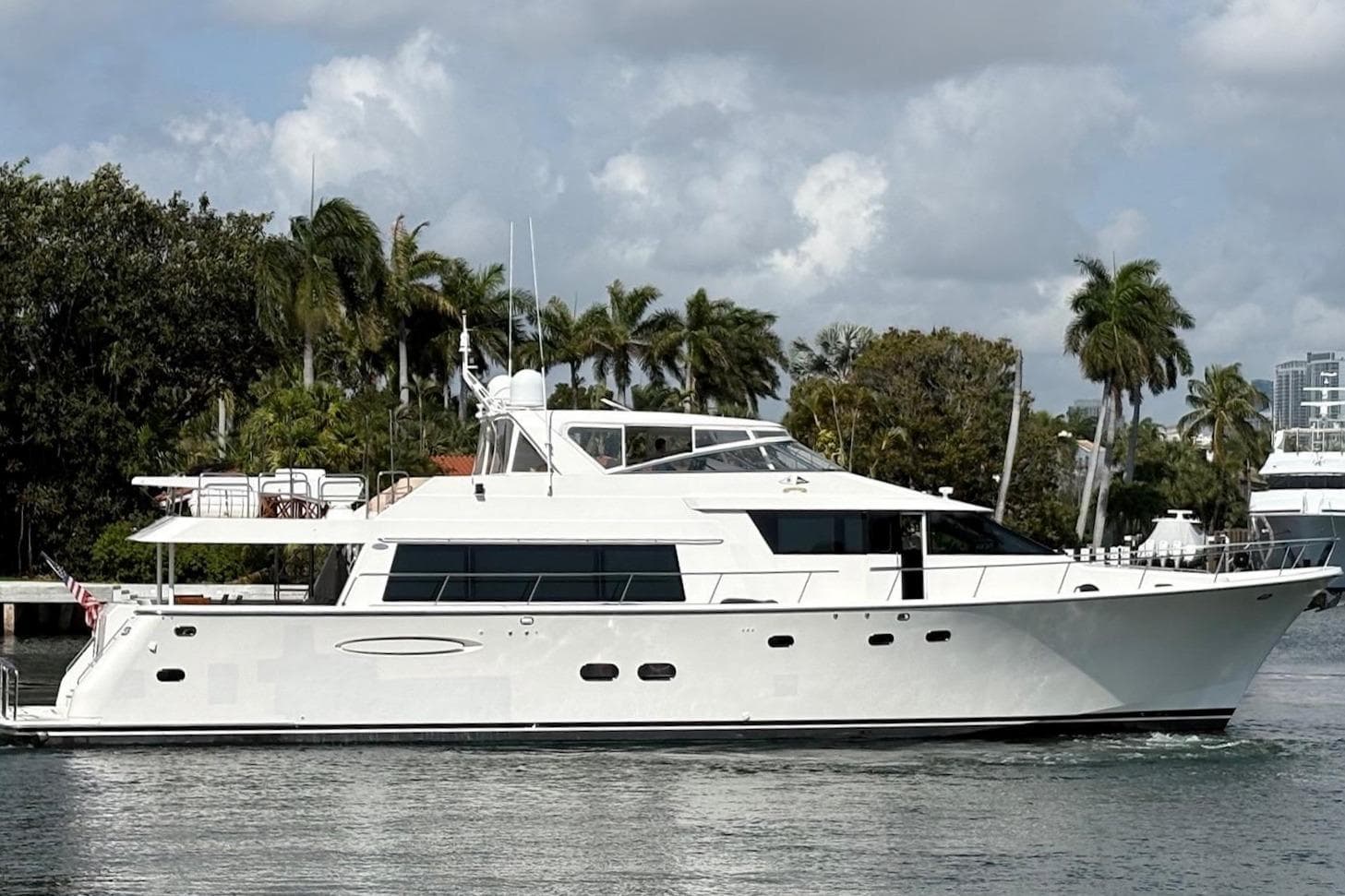 2005 Pacific Mariner Raised Pilothouse Motoryacht on calm waters.