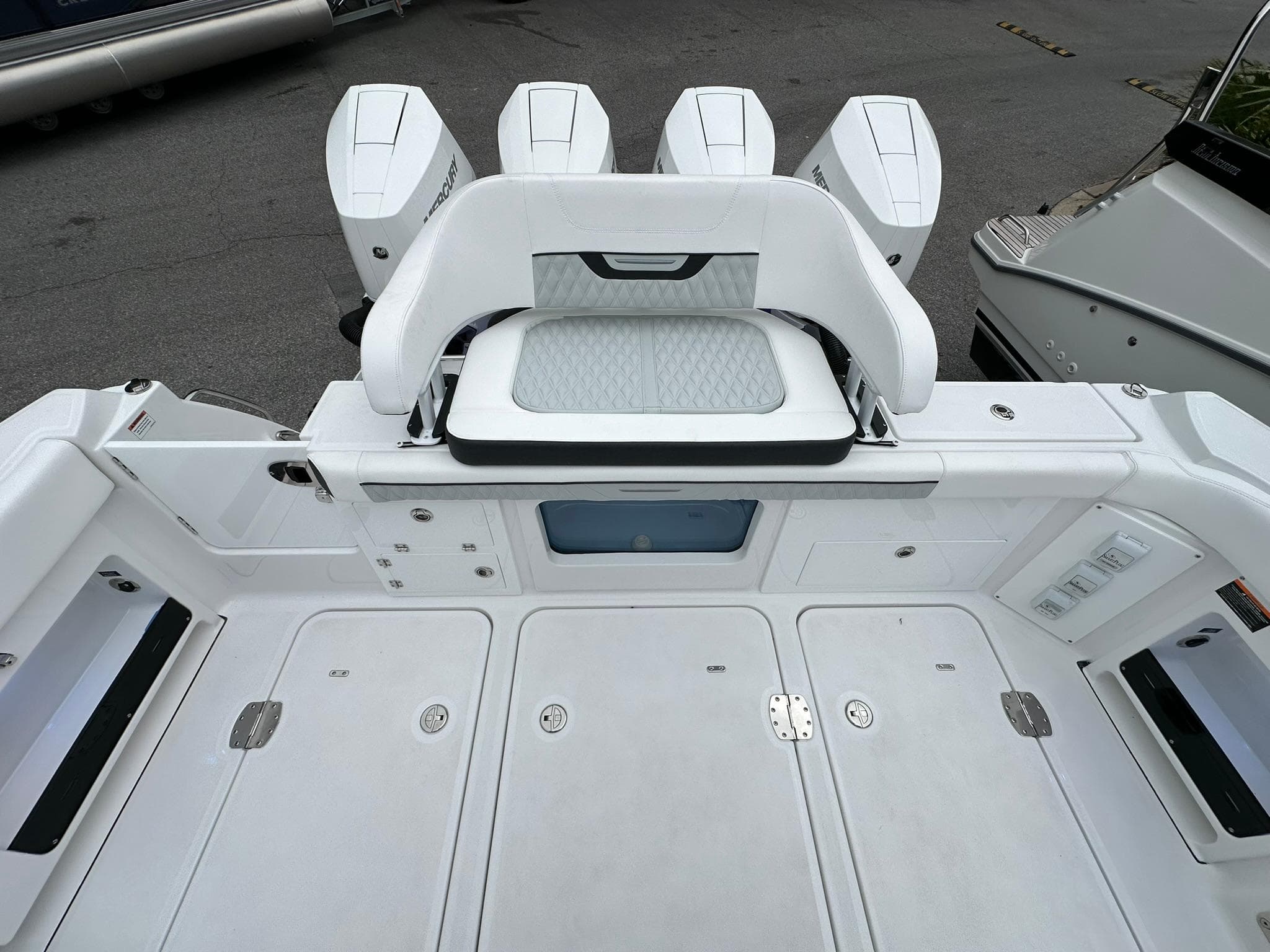 2024 Blackfin 400 CC boat deck with quad outboard engines.