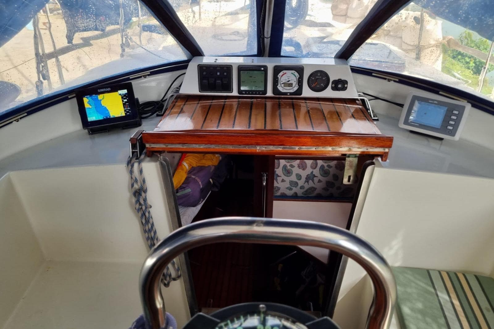 Cockpit of 1989 Bruce Roberts Offshore 38 sailboat with navigation instruments.