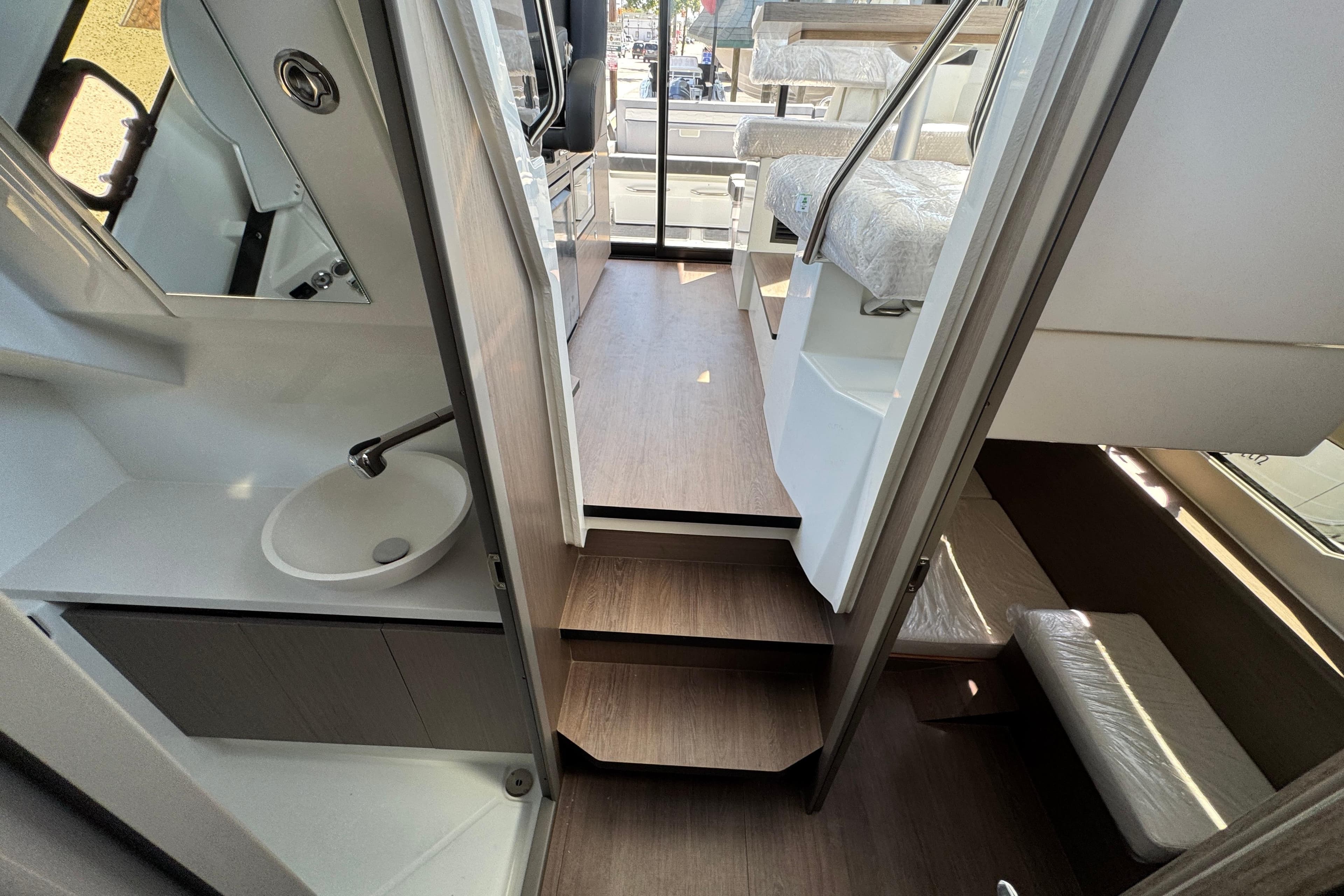 Interior of 2026 Jeanneau NC 895 Series 2 boat, featuring modern design and compact layout.