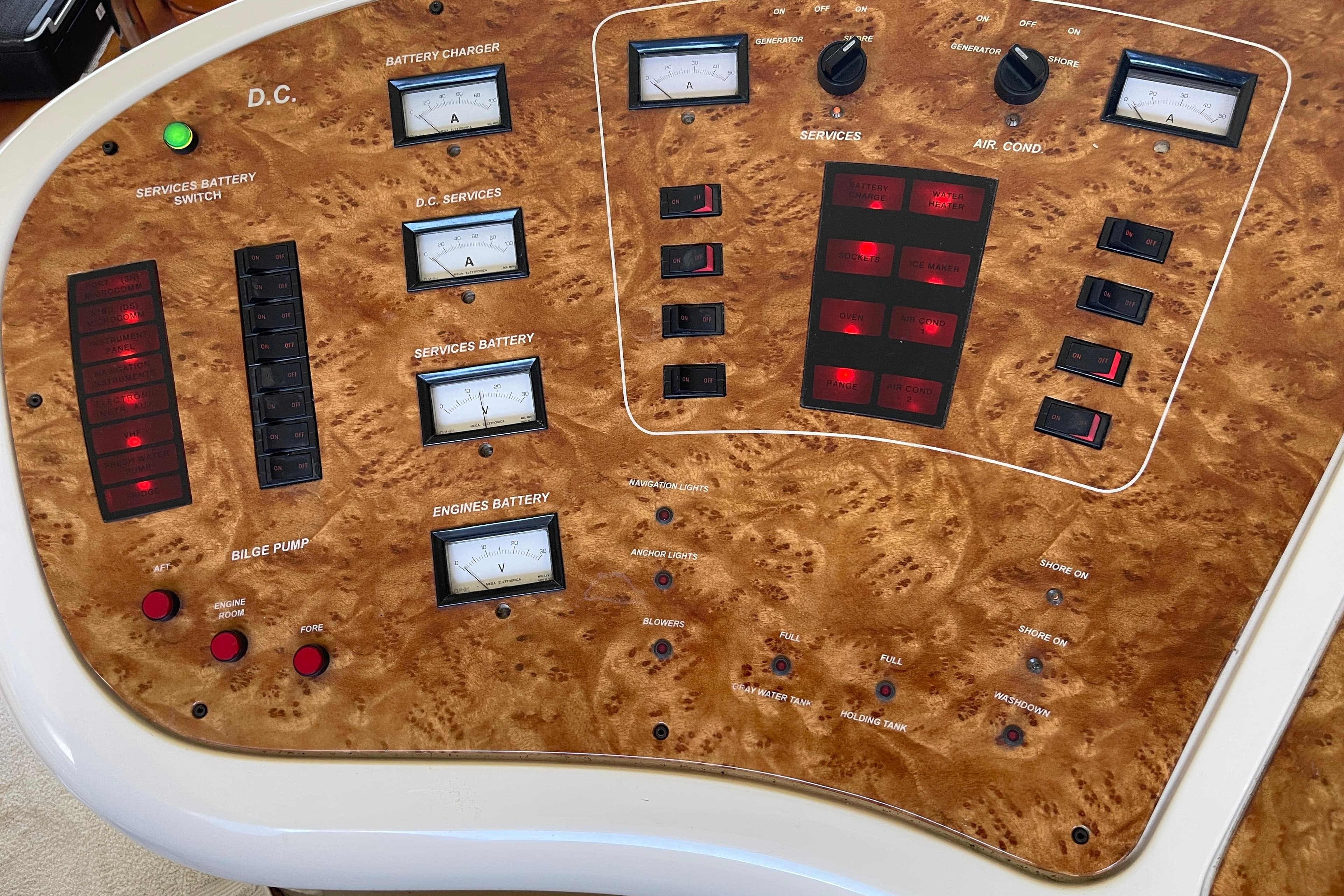 Control panel of a 2000 Azimut 46 Flybridge MY yacht with various switches and gauges.