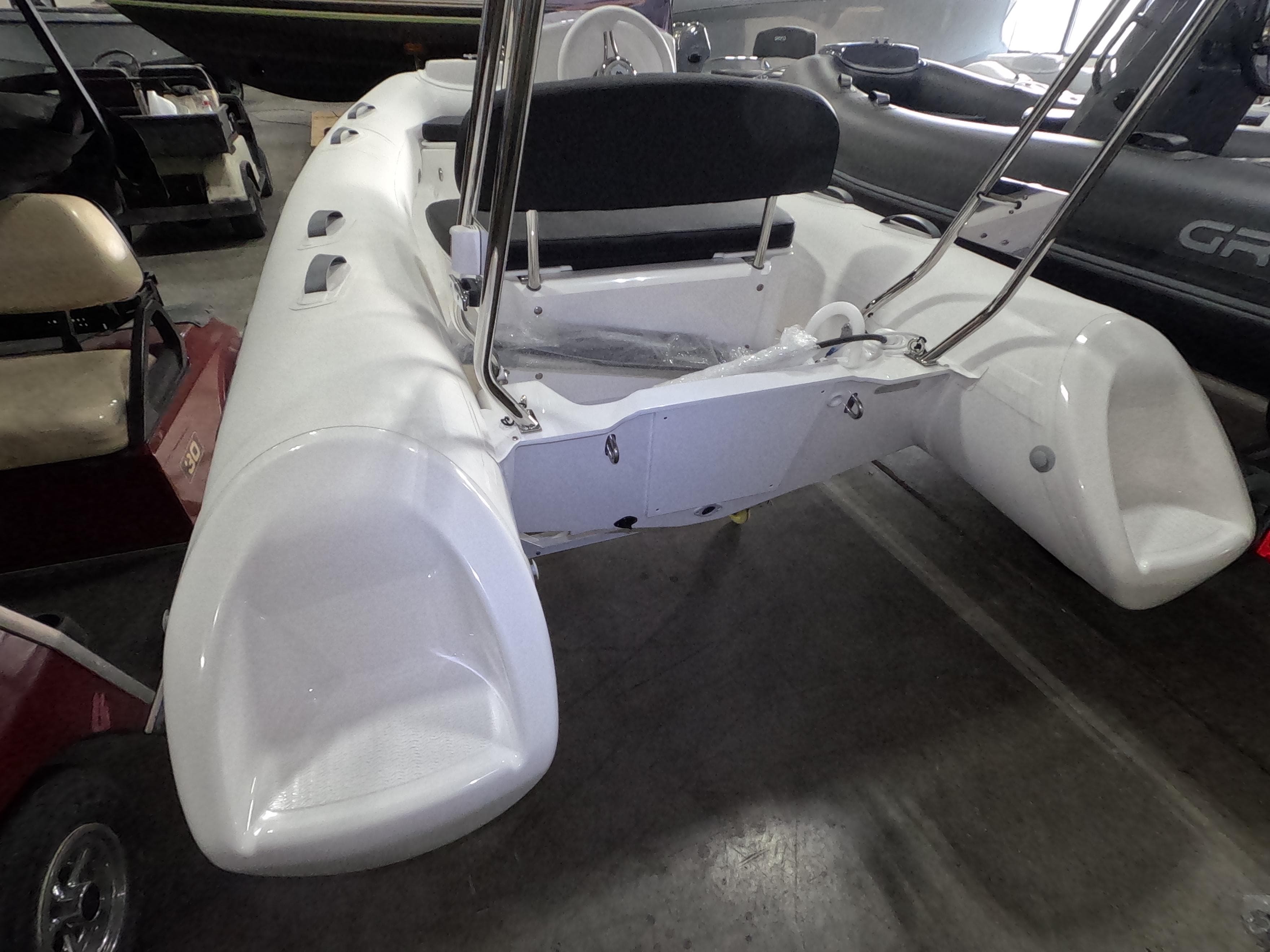 2024 Grand Inflatables S370NL white inflatable boat in showroom.