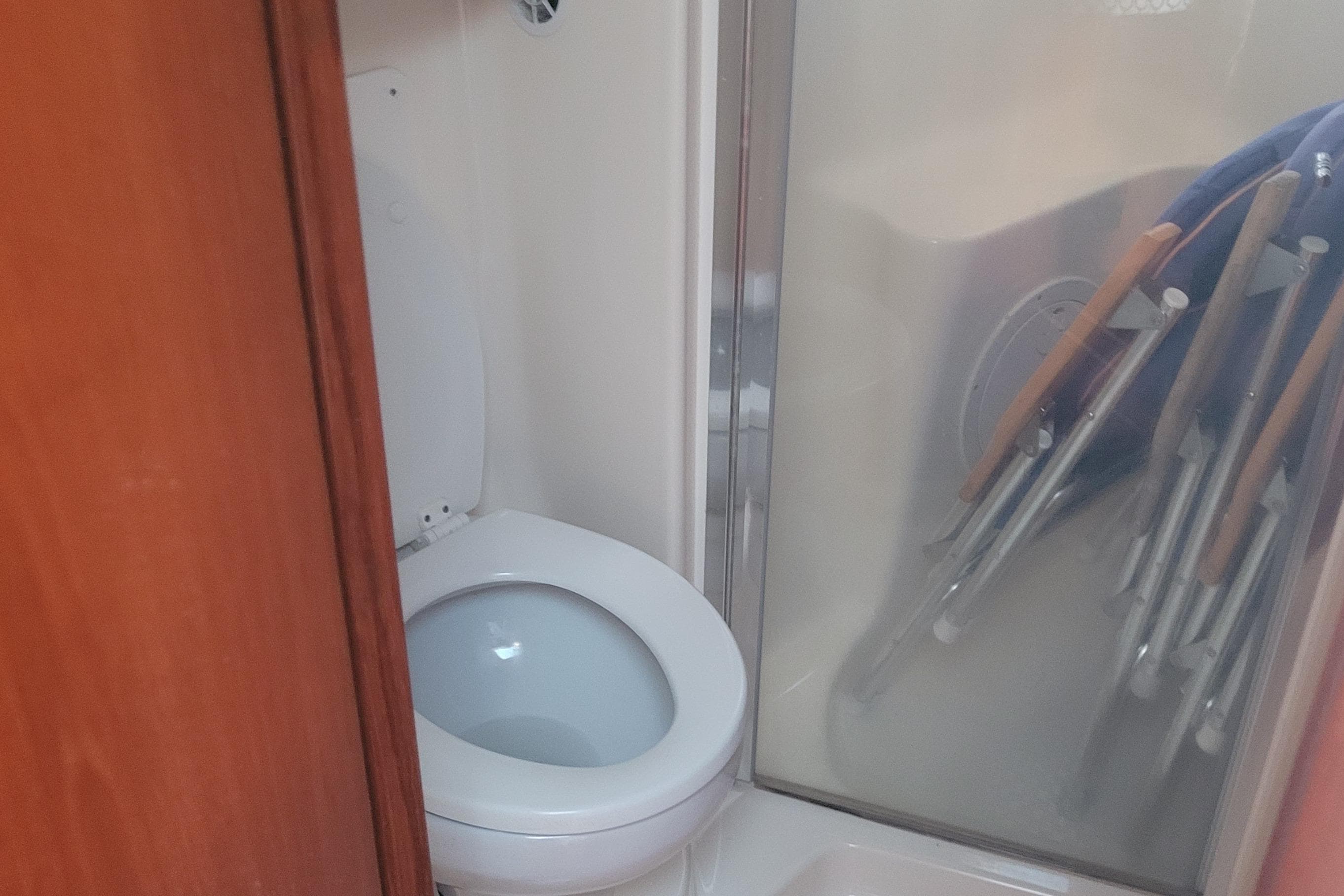 2006 Tiara Yachts 4200 Open bathroom with toilet and shower area.