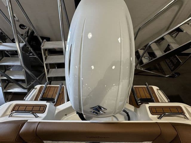 2025 Pioneer ISLANDER 202 boat with sleek design and modern outboard motor.