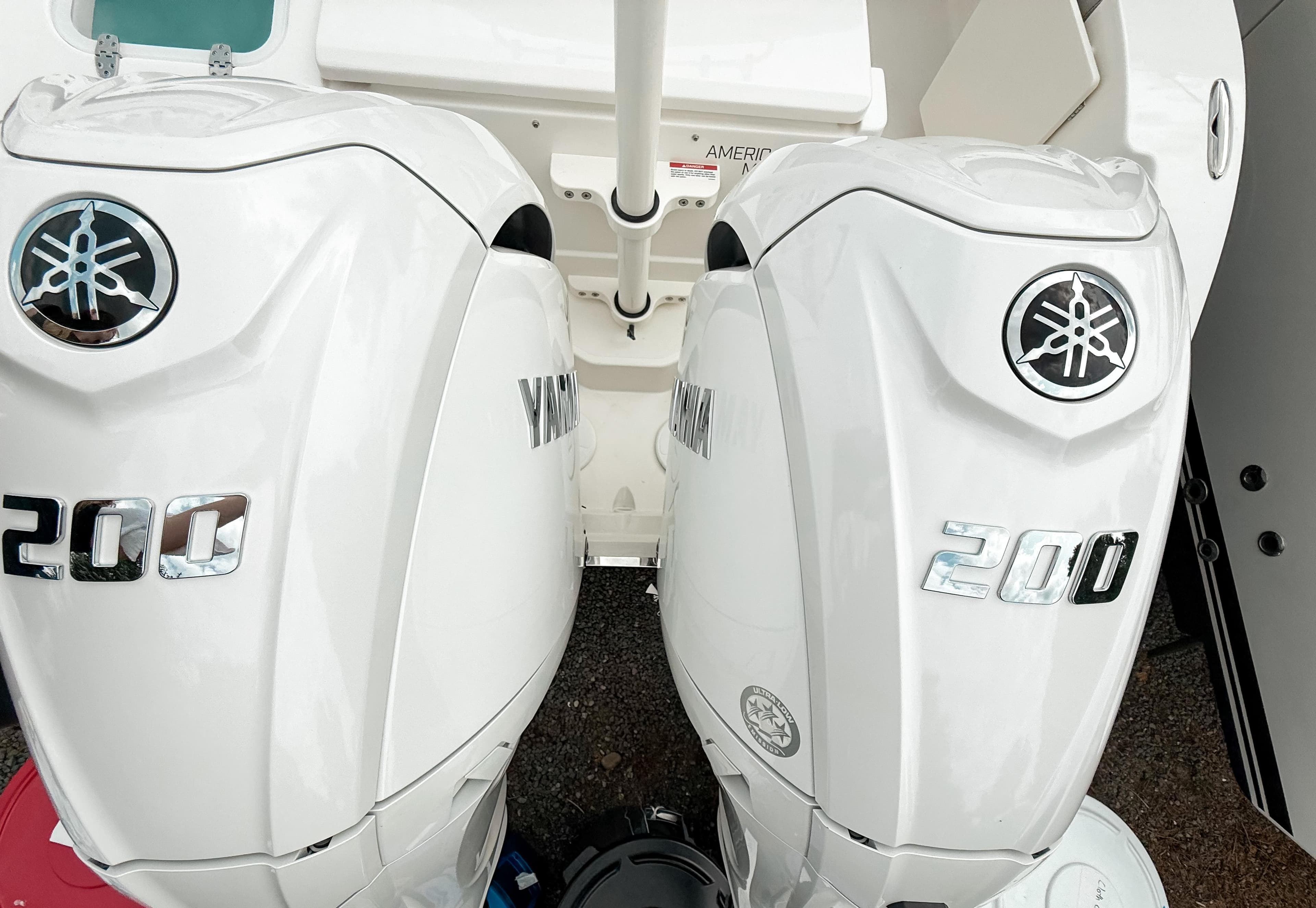 Twin Yamaha 200 engines on a 2025 Pursuit DC 266 Dual Console boat.