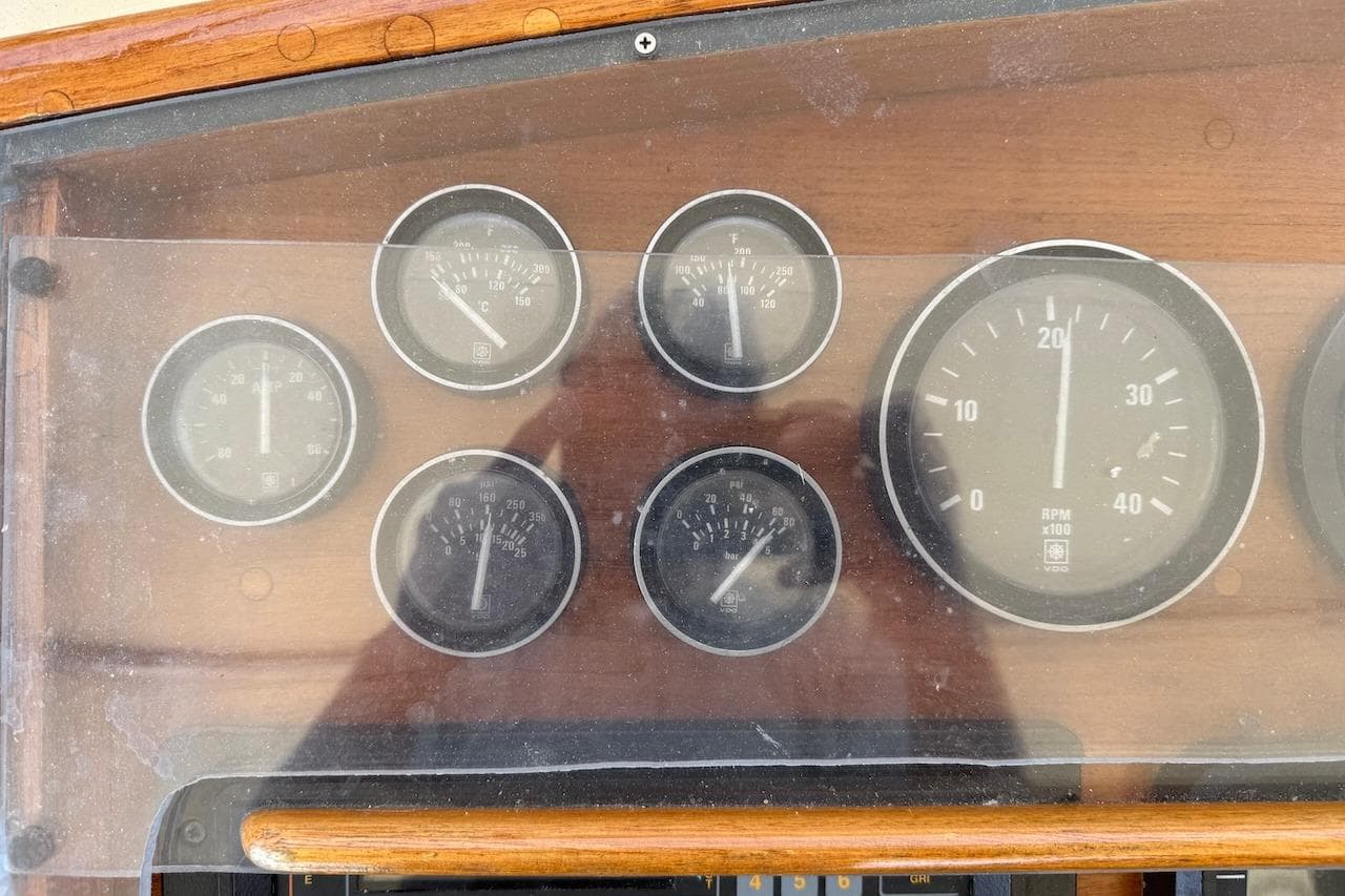Dashboard gauges of a 1990 Nauset Flybridge Cruiser with Extended Hardtop.