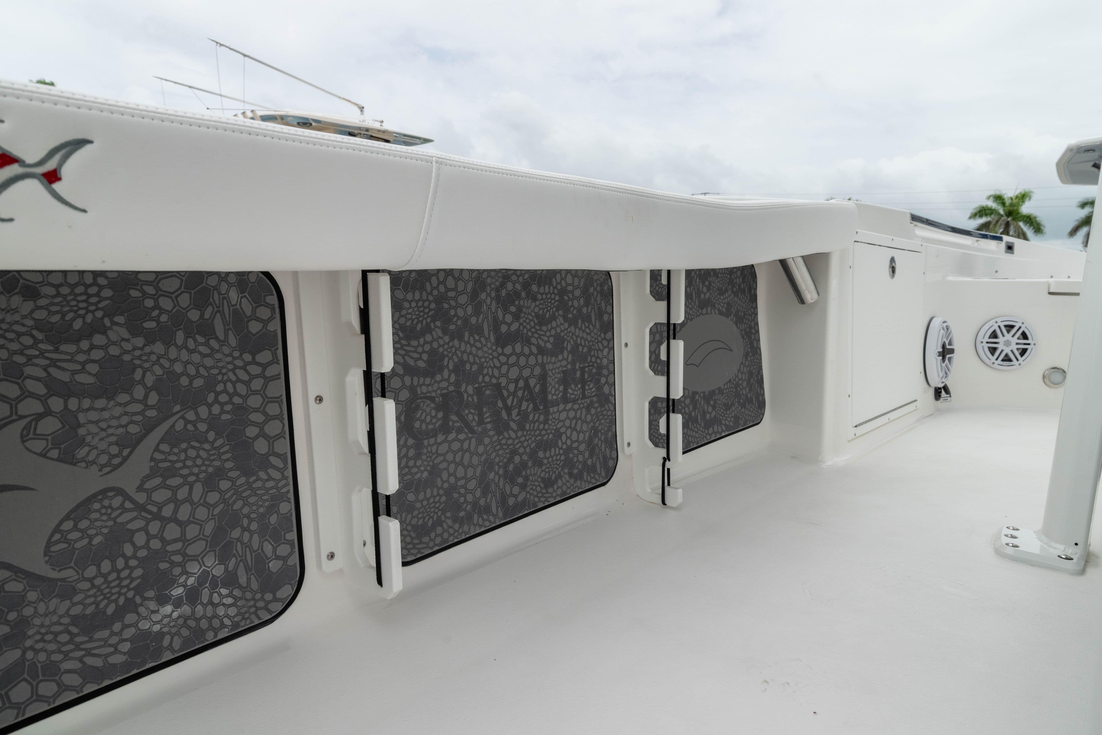 2026 Crevalle 24 HCO boat interior with storage compartments and sleek design.