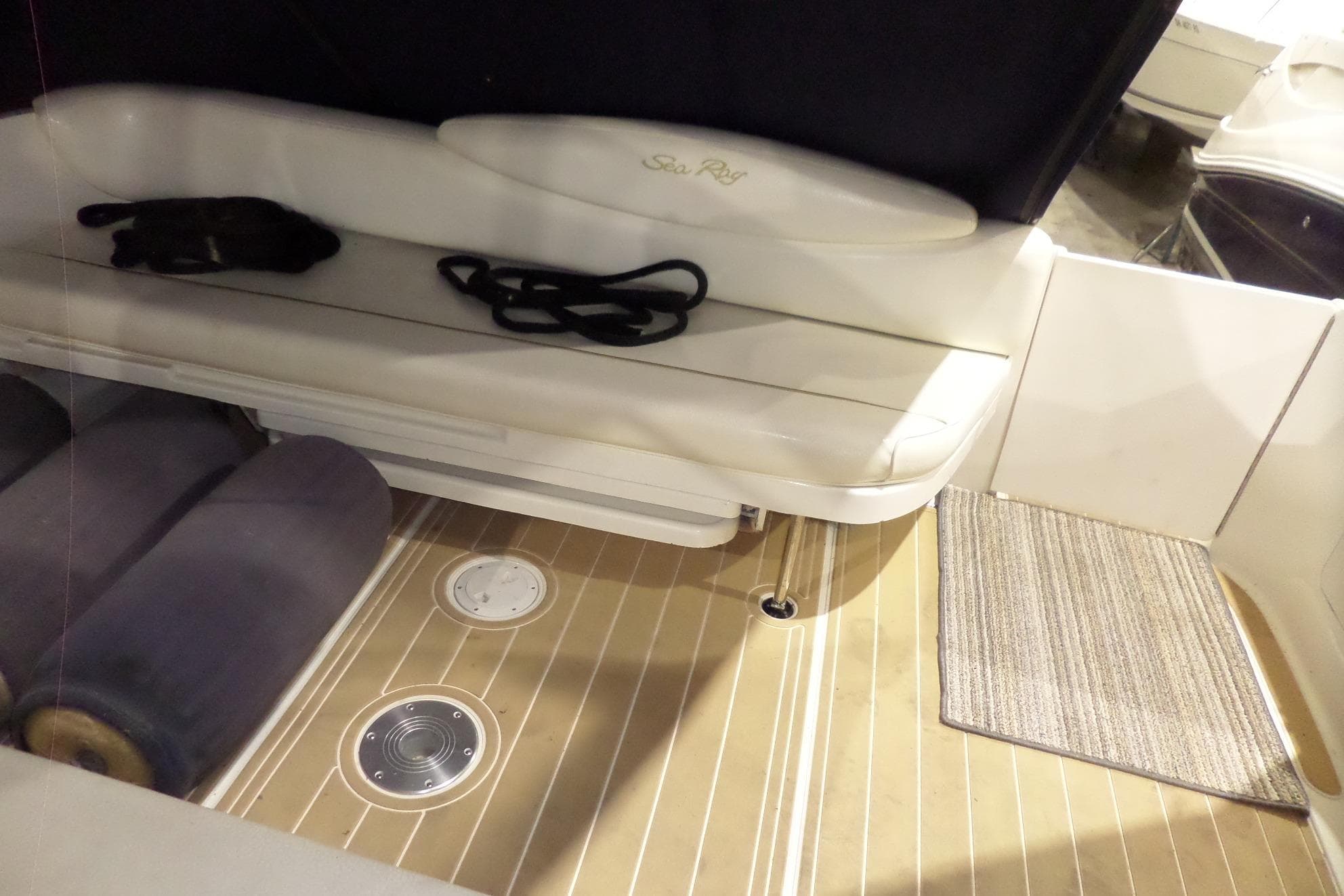 Interior of 2000 Sea Ray 340 Sundancer boat with seating and deck details.