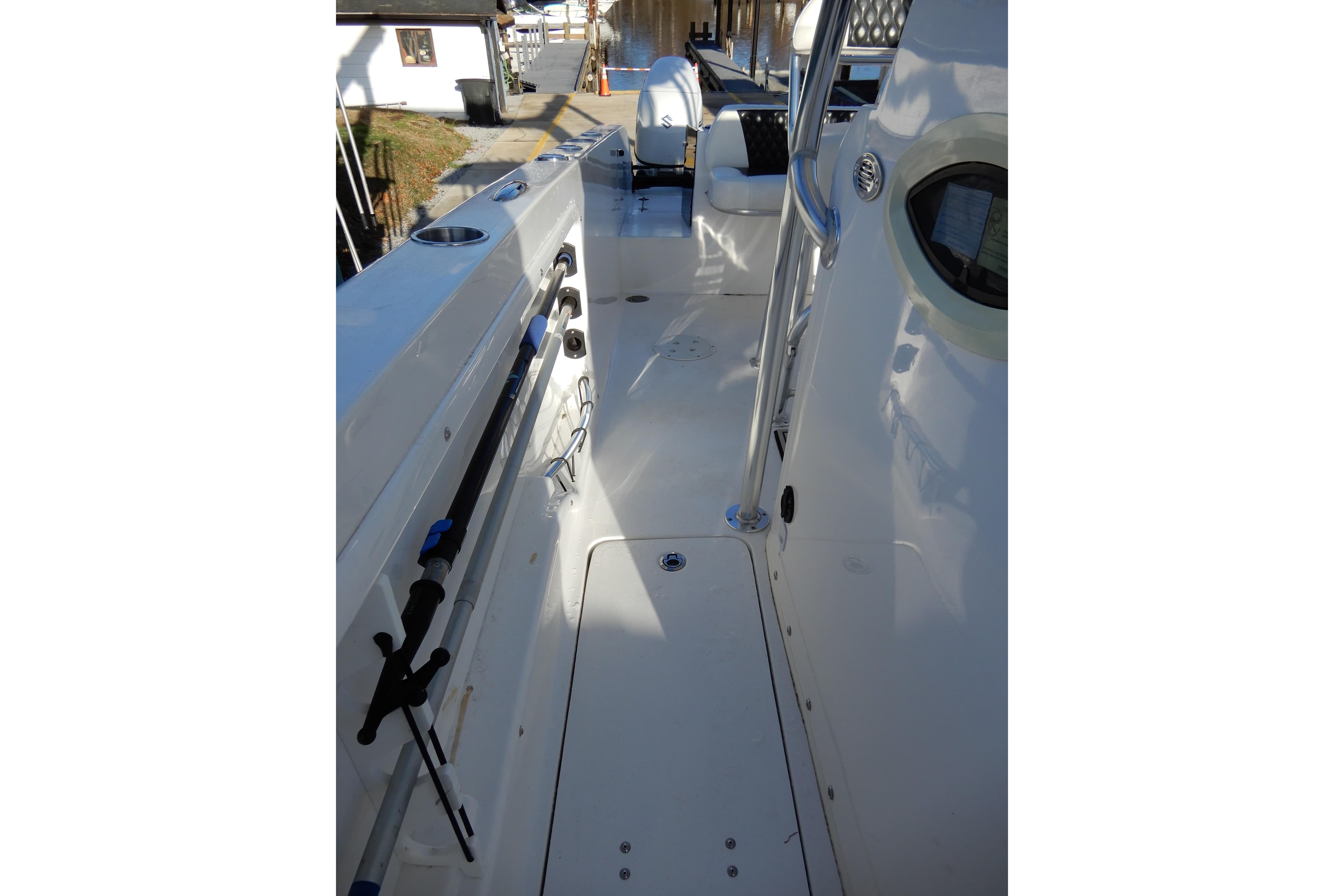2022 Twin Vee 240 CC GFX Limited Edition boat interior with fishing rod holders.