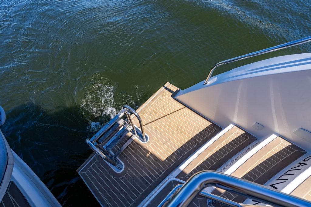 Stern view of 2022 Leopard 53 Powercat with swim platform and ladder.