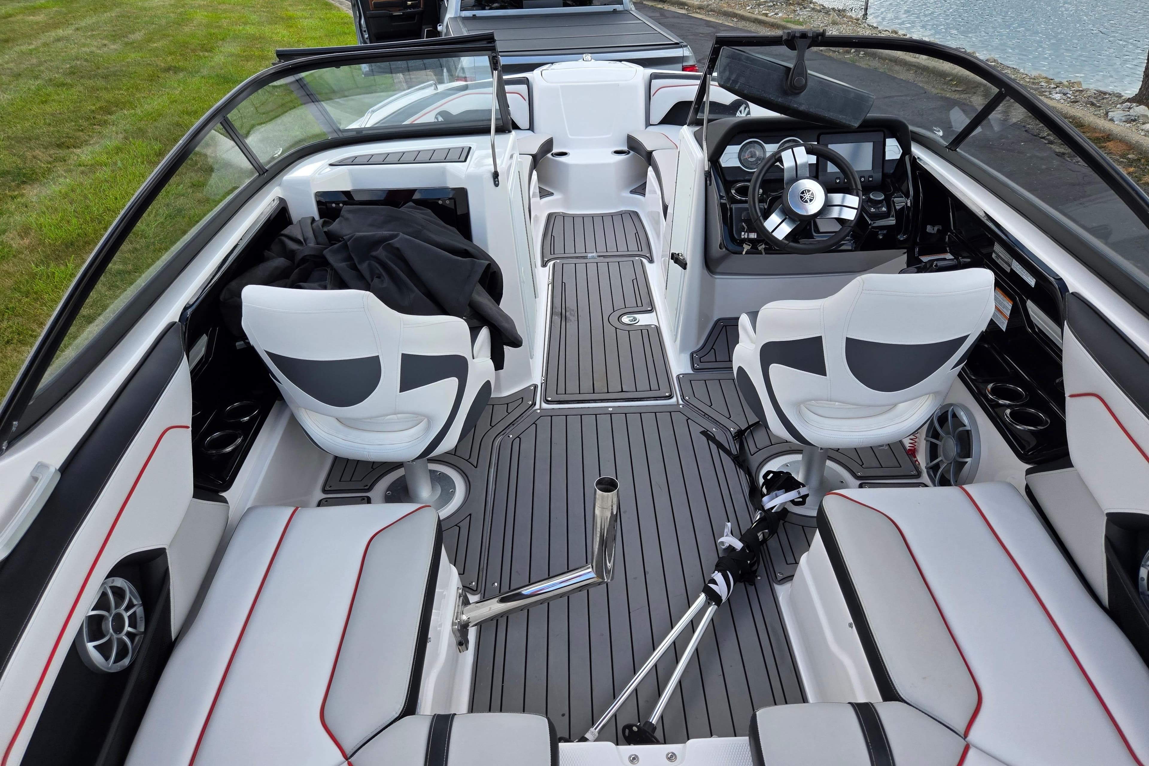 2018 Yamaha Boats 212X interior with sleek seating and modern dashboard design.