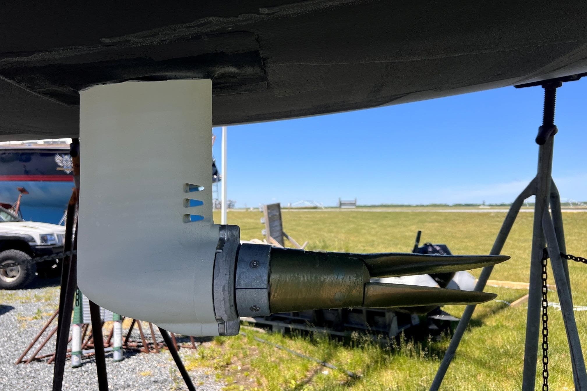 Dehler 34c 2019 sailboat propeller and rudder detail on land.
