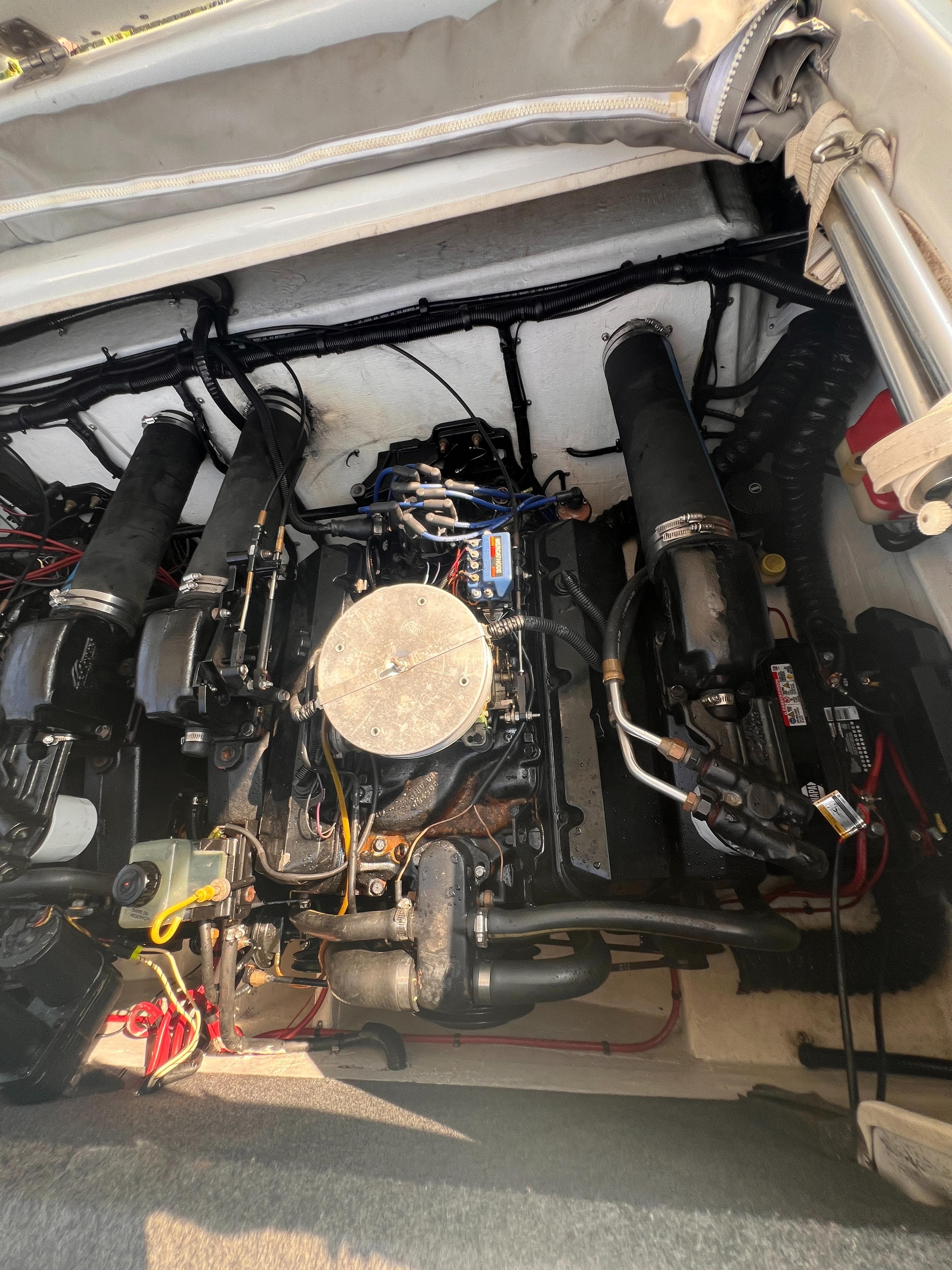 1995 Powerquest 290 Enticer FX engine compartment with visible components and wiring.