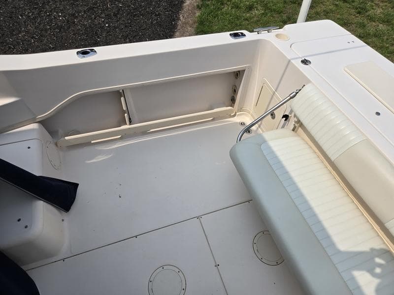 2007 Grady-White 232 Gulfstream boat interior with seating and storage area.