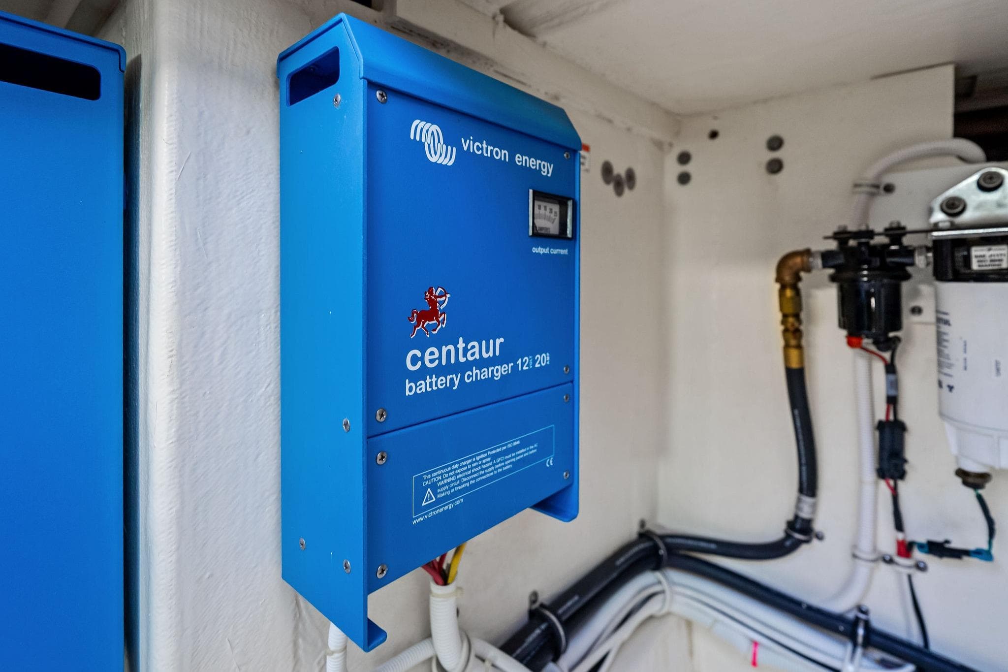 Victron Energy Centaur battery charger in 2019 Tiara Yachts 38 LS engine room.