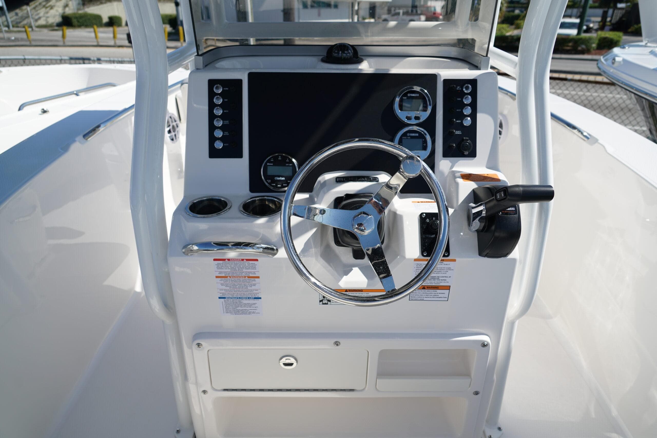 2025 Robalo R200 Center Console boat dashboard with steering wheel and controls.
