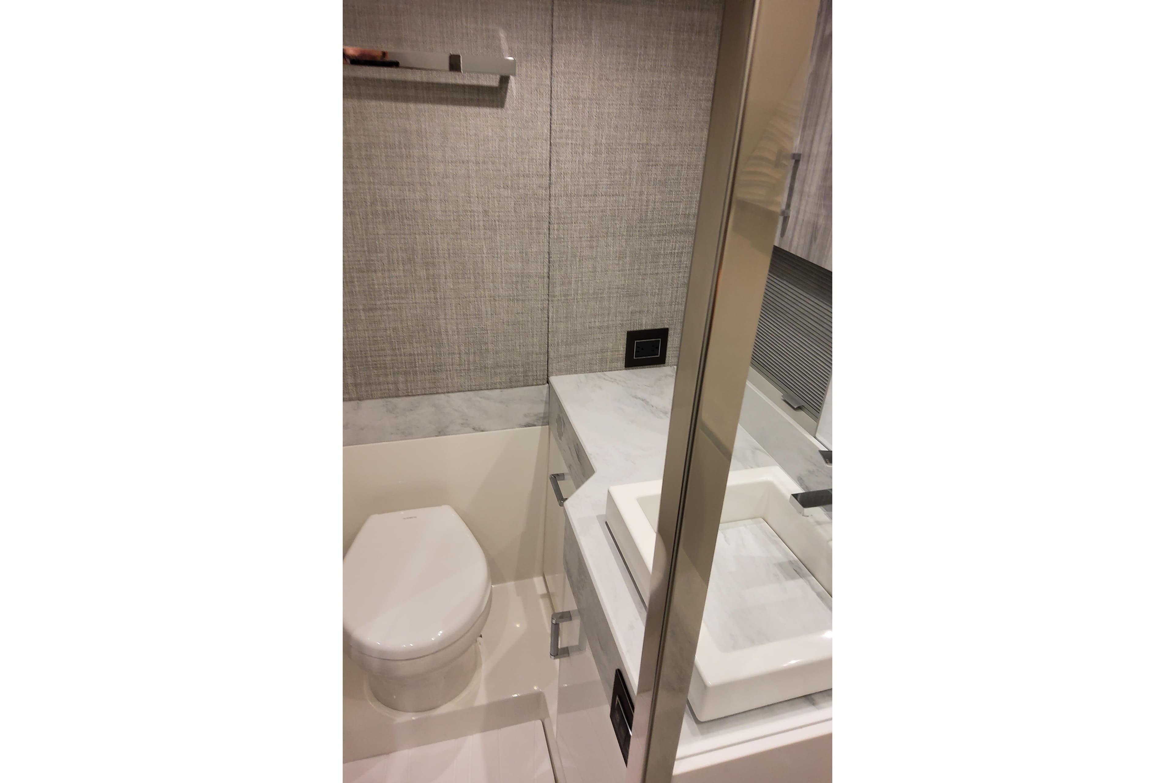 Modern bathroom interior in 2026 Formula 500 Super Sport Crossover yacht.