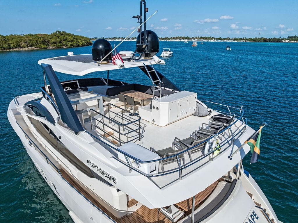 Luxurious 2013 Astondoa 72 GLX yacht cruising on clear blue waters.