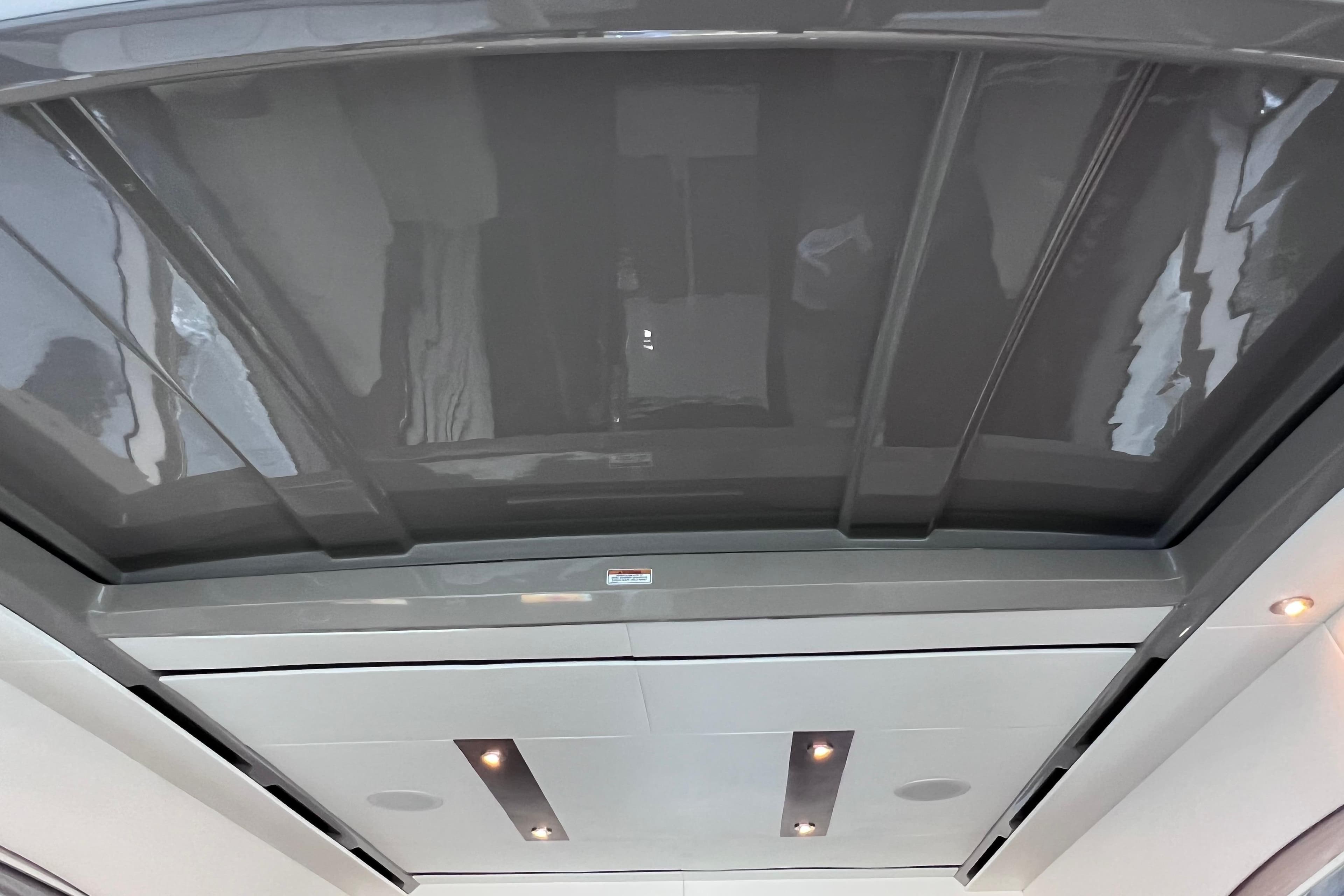 Ceiling view of 2017 Sea Ray Sundancer 400 yacht with modern lighting.