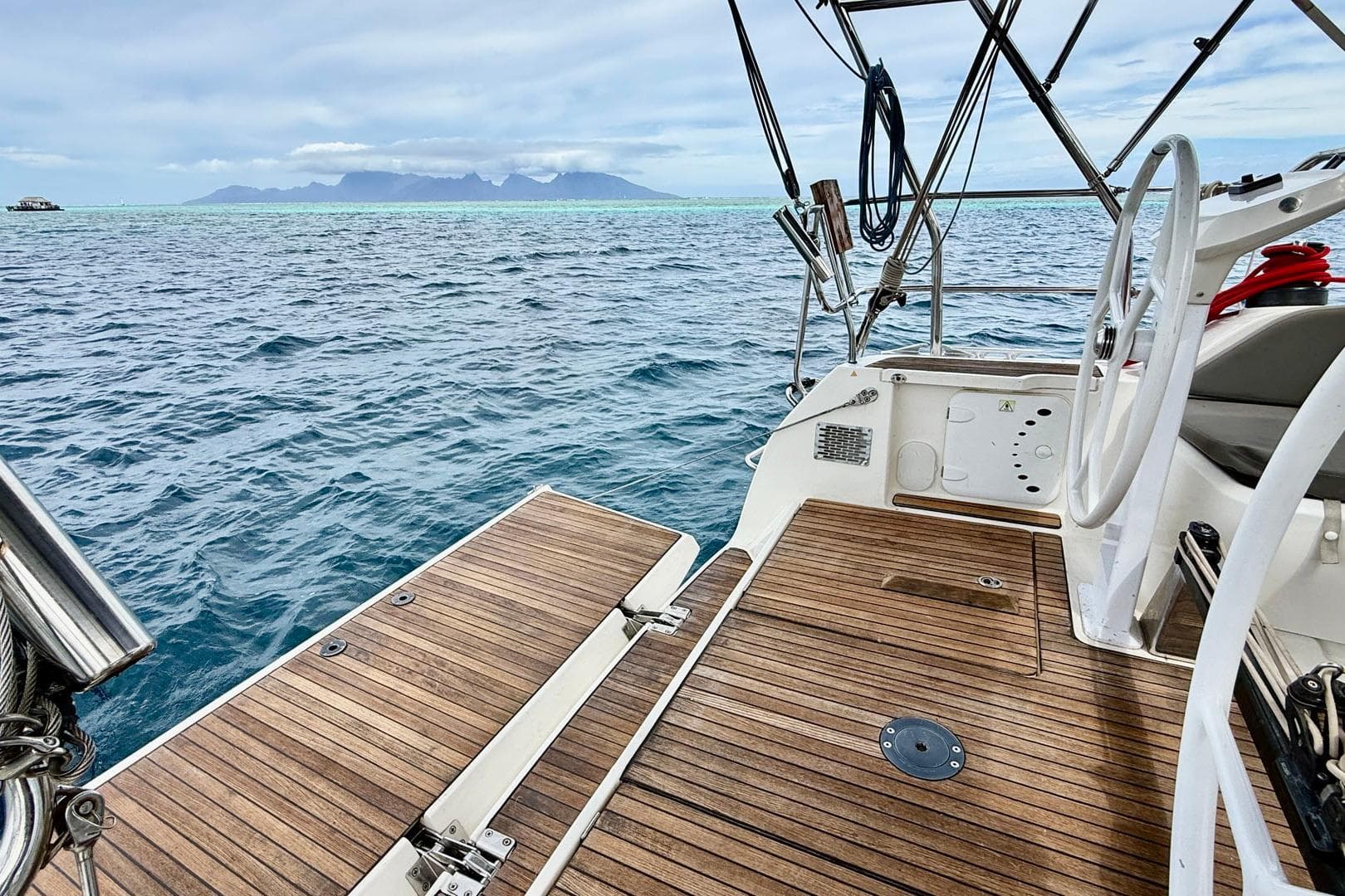2017 Bavaria Cruiser 41S yacht deck with ocean view and distant mountains.