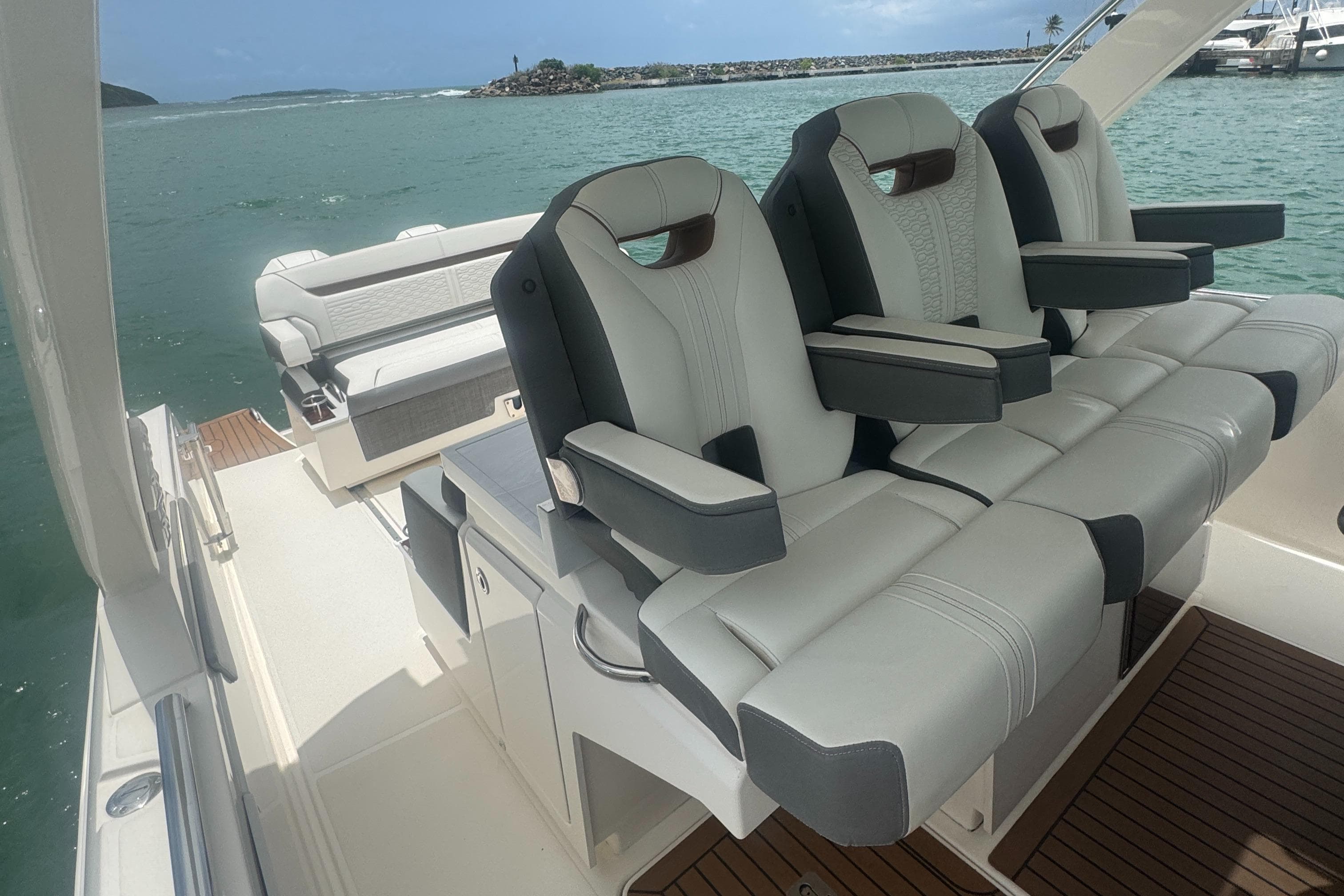 2020 Tiara Sport 34 LS boat interior with luxurious seating and ocean view.