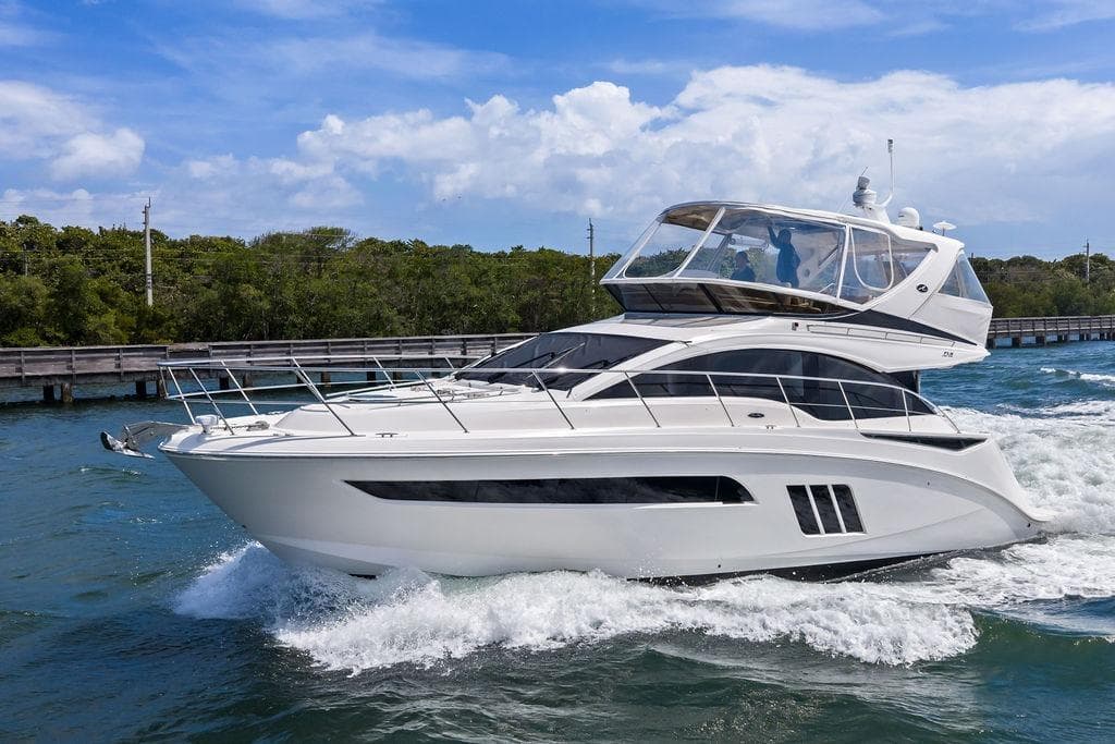2017 Sea Ray Fly 510 yacht cruising on a sunny day.
