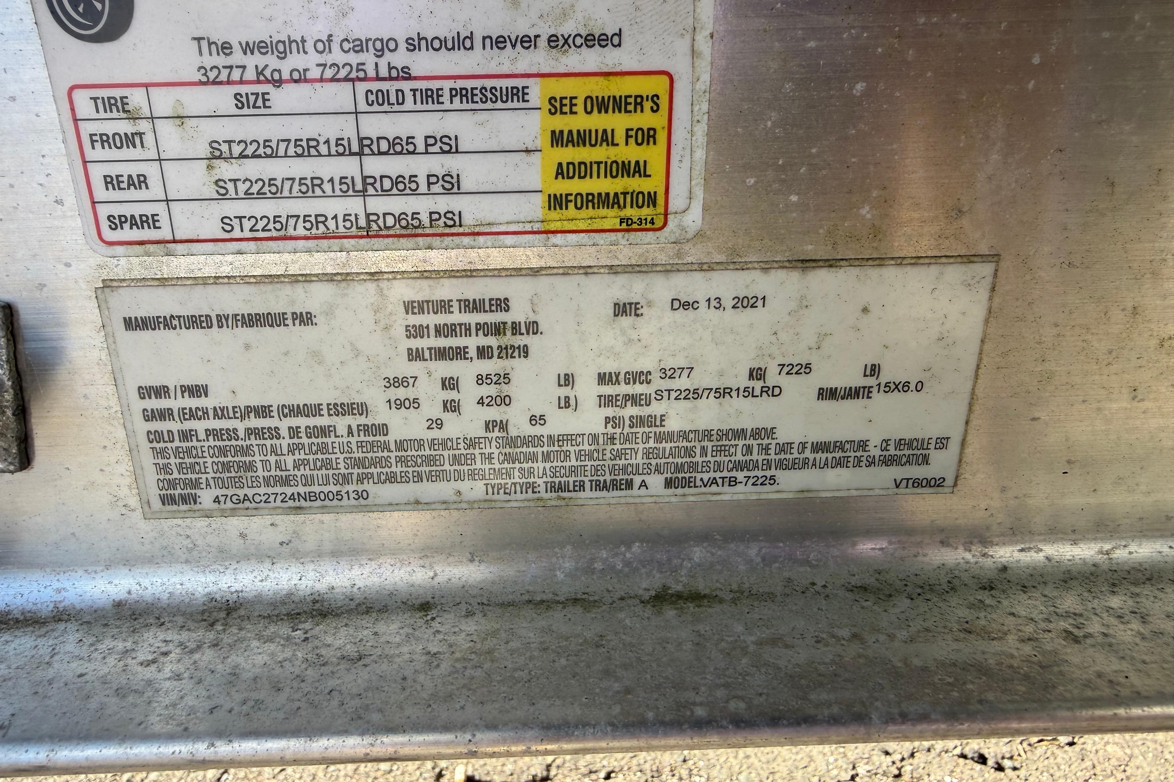 Label on a 2016 Cutwater 24 trailer detailing tire specifications and weight limits.