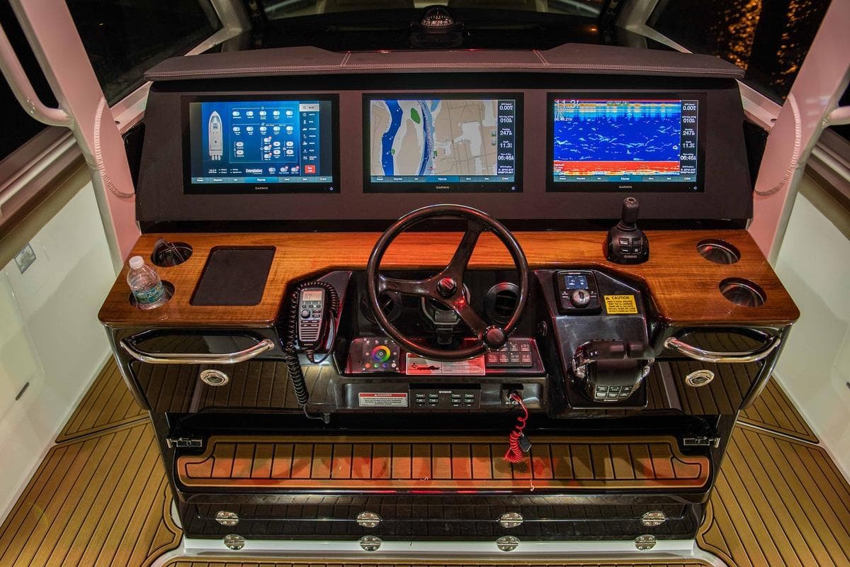 Manufacturer Provided Image: 2025 Everglades 395 Center Console helm with advanced navigation displays and controls.