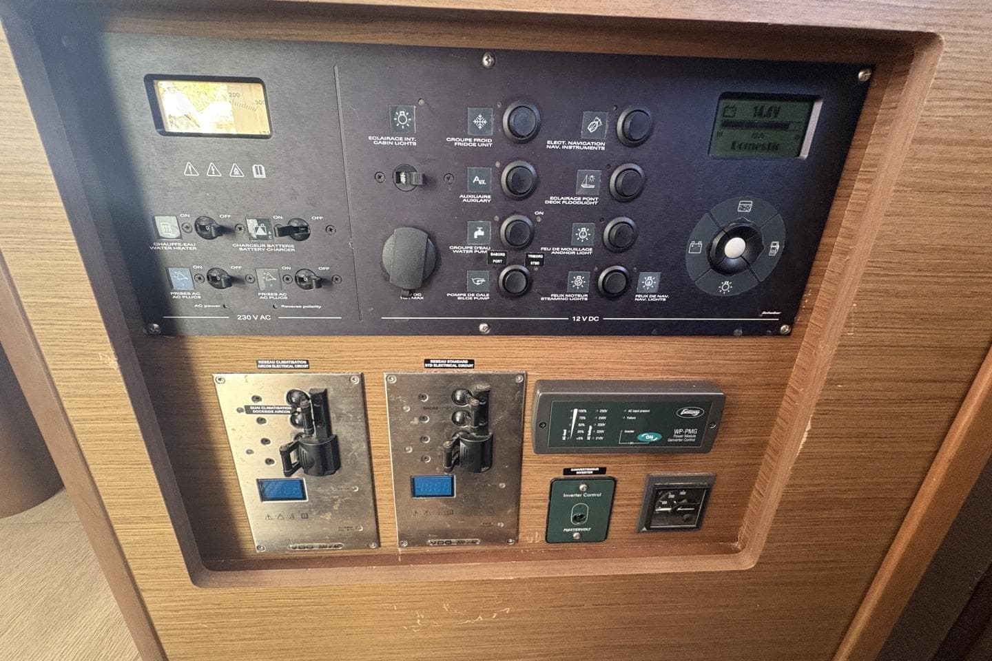 Control panel of a 2019 Lagoon 42 yacht, featuring various switches and displays.