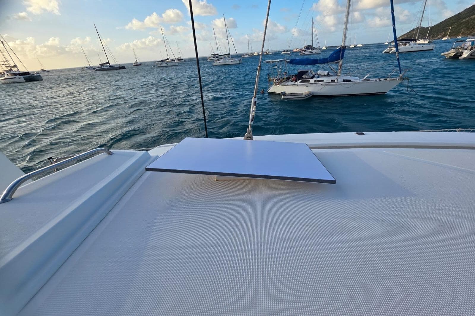 Sailing scene from a 2016 Bali 4.5 catamaran, with yachts on a sunny day.