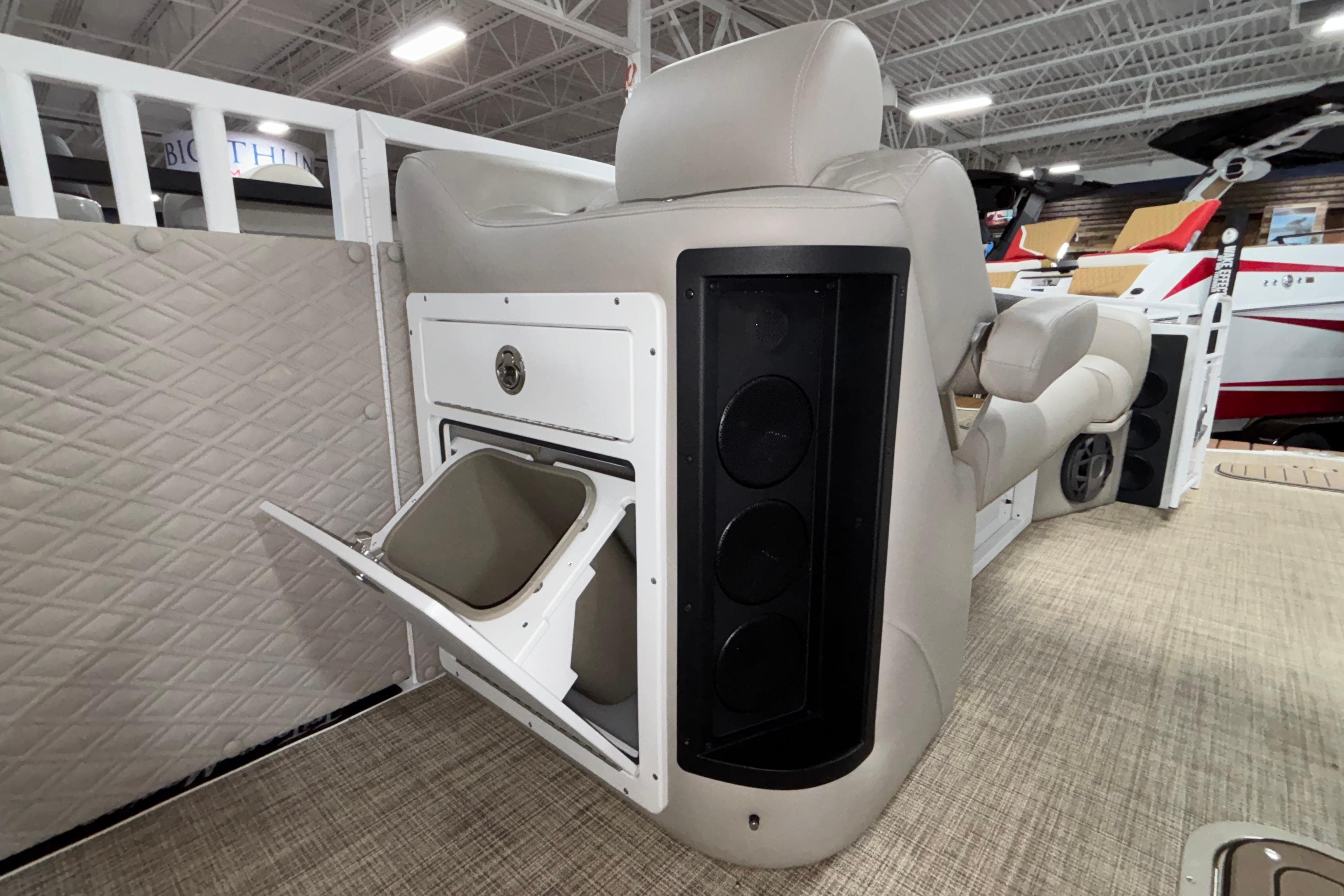 Luxurious seating and storage on the 2026 JC Sporttoon 26TT boat.