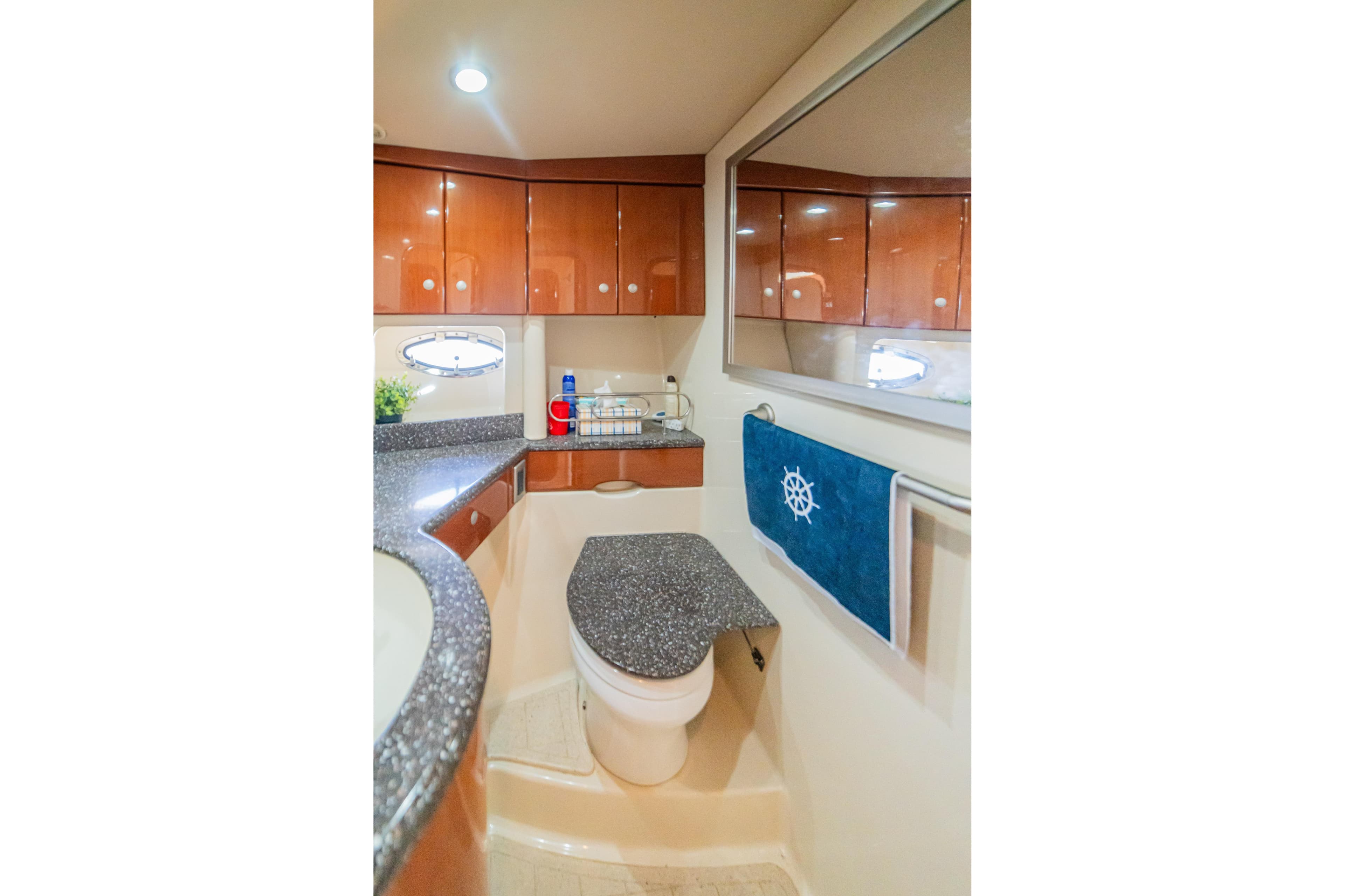 Luxurious bathroom interior of 2008 Formula 45 Yacht with modern fixtures and elegant design.